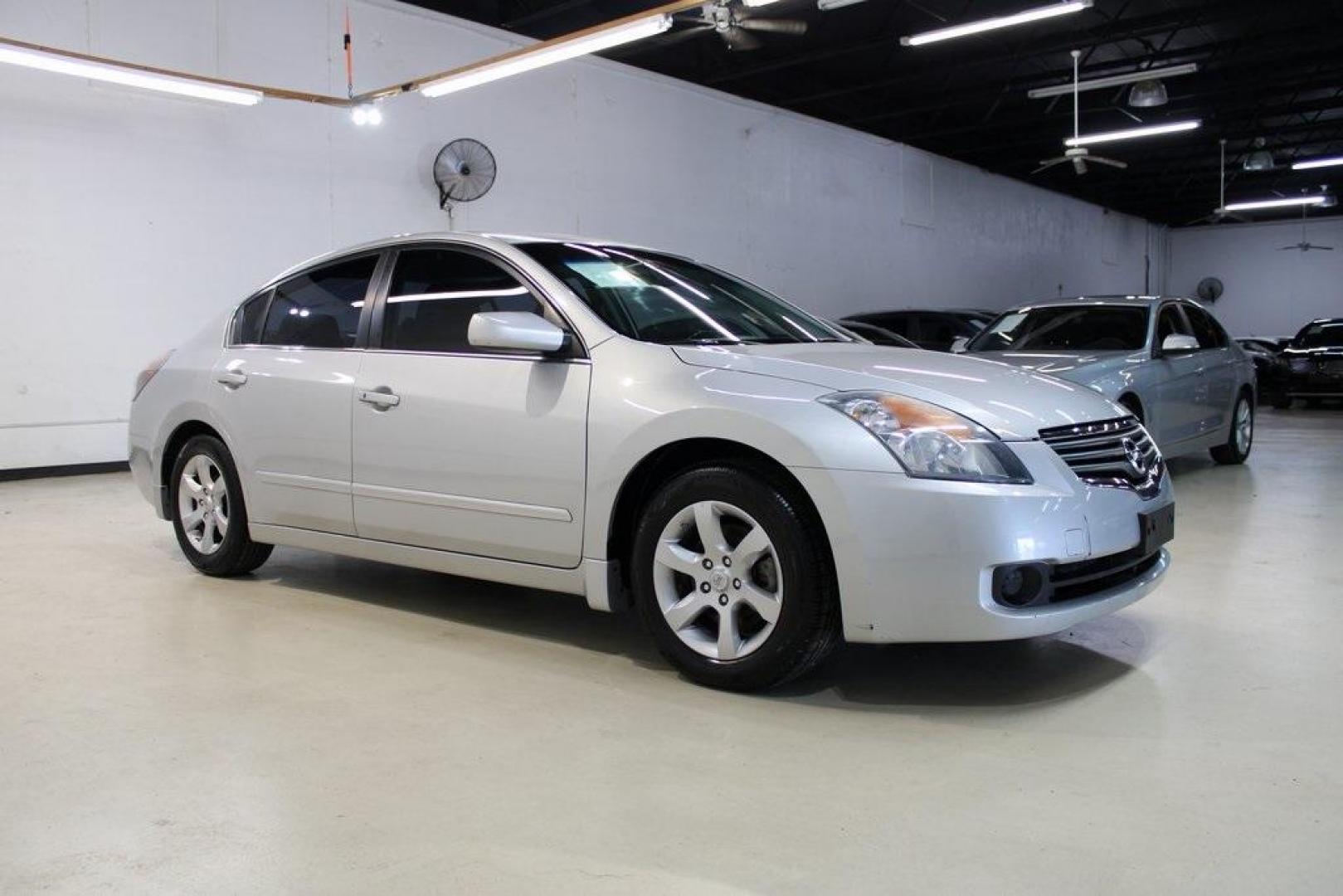 2008 Silver Lightning Metallic /Charcoal Nissan Altima 2.5 SL (1N4AL21E68N) with an 2.5L I4 SMPI DOHC engine, CVT transmission, located at 15300 Midway Rd., Addison, TX, 75001, (972) 702-0011, 32.958321, -96.838074 - HOME OF THE NO HAGGLE PRICE - WHOLESALE PRICES TO THE PUBLIC!! Altima 2.5 SL, 4D Sedan, 2.5L I4 SMPI DOHC, CVT, FWD, Silver Lightning Metallic, Charcoal w/Leather Appointed Seats.<br><br>Silver Lightning Metallic 2008 Nissan Altima 2.5 SL<br><br>23/31 City/Highway MPG<br><br><br>At Midway Auto Group - Photo#6