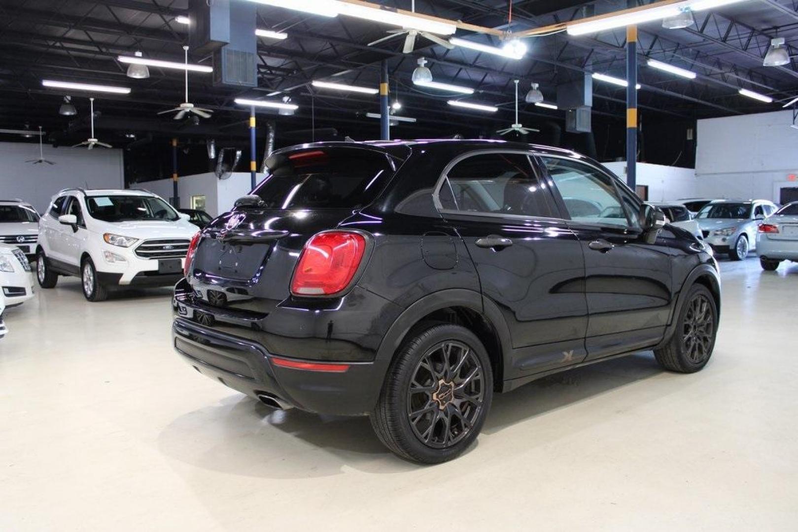 2017 Nero Cinema (Black Clear Coat) /Black Fiat 500X Trekking (ZFBCFXCB7HP) with an 2.4L I4 MultiAir engine, Automatic transmission, located at 15300 Midway Rd., Addison, TX, 75001, (972) 702-0011, 32.958321, -96.838074 - HOME OF THE NO HAGGLE PRICE - WHOLESALE PRICES TO THE PUBLIC!! 500X Trekking, 4D Sport Utility, 2.4L I4 MultiAir, 9-Speed 948TE Automatic, FWD, Nero Cinema (Black Clear Coat), Black Cloth.<br><br>Nero Cinema (Black Clear Coat) 2017 Fiat 500X Trekking<br><br>Recent Arrival! 22/30 City/Highway MPG<br> - Photo#4