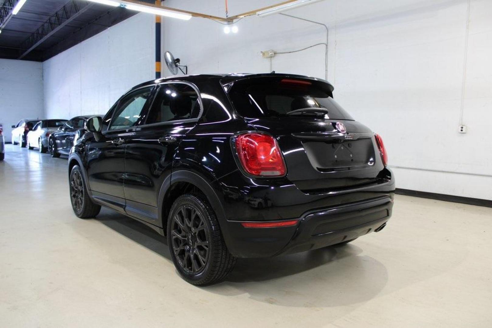 2017 Nero Cinema (Black Clear Coat) /Black Fiat 500X Trekking (ZFBCFXCB7HP) with an 2.4L I4 MultiAir engine, Automatic transmission, located at 15300 Midway Rd., Addison, TX, 75001, (972) 702-0011, 32.958321, -96.838074 - HOME OF THE NO HAGGLE PRICE - WHOLESALE PRICES TO THE PUBLIC!! 500X Trekking, 4D Sport Utility, 2.4L I4 MultiAir, 9-Speed 948TE Automatic, FWD, Nero Cinema (Black Clear Coat), Black Cloth.<br><br>Nero Cinema (Black Clear Coat) 2017 Fiat 500X Trekking<br><br>Recent Arrival! 22/30 City/Highway MPG<br> - Photo#5