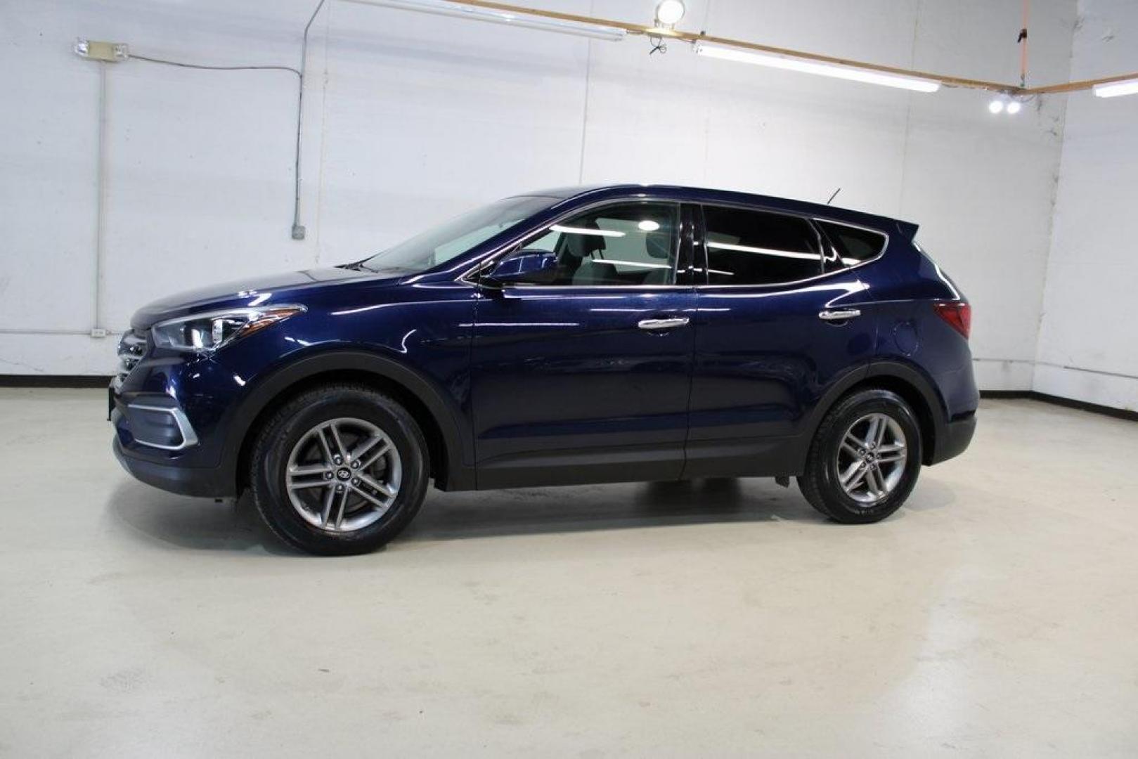 2018 Nightfall Blue /Beige Hyundai Santa Fe Sport 2.4 Base (5XYZT3LB2JG) with an 2.4L I4 DGI DOHC 16V engine, Automatic transmission, located at 15300 Midway Rd., Addison, TX, 75001, (972) 702-0011, 32.958321, -96.838074 - Photo#4