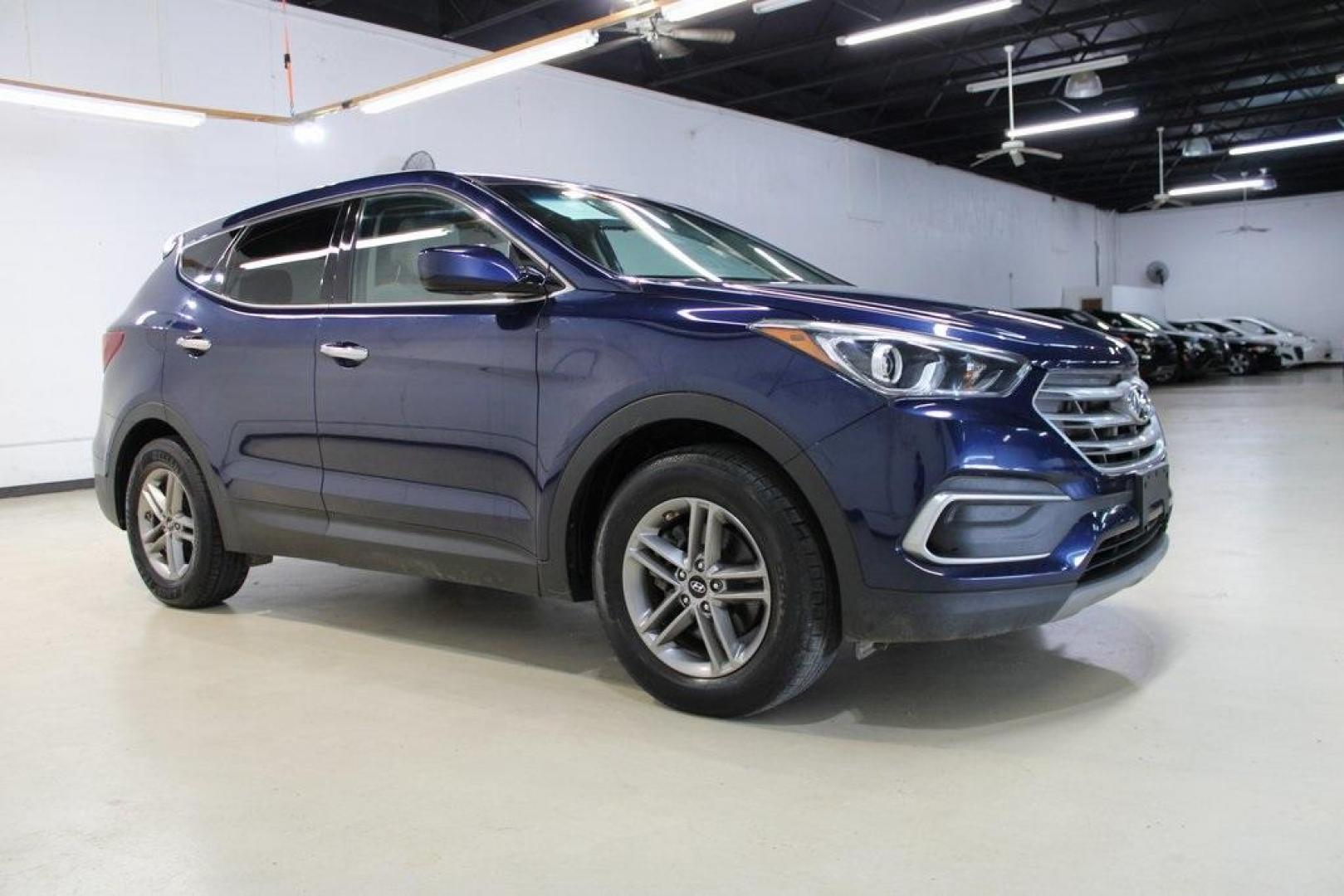 2018 Nightfall Blue /Beige Hyundai Santa Fe Sport 2.4 Base (5XYZT3LB2JG) with an 2.4L I4 DGI DOHC 16V engine, Automatic transmission, located at 15300 Midway Rd., Addison, TX, 75001, (972) 702-0011, 32.958321, -96.838074 - Photo#6