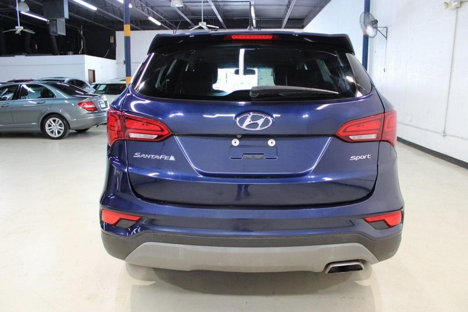 2018 Nightfall Blue /Beige Hyundai Santa Fe Sport 2.4 Base (5XYZT3LB2JG) with an 2.4L I4 DGI DOHC 16V engine, Automatic transmission, located at 15300 Midway Rd., Addison, TX, 75001, (972) 702-0011, 32.958321, -96.838074 - Photo#7