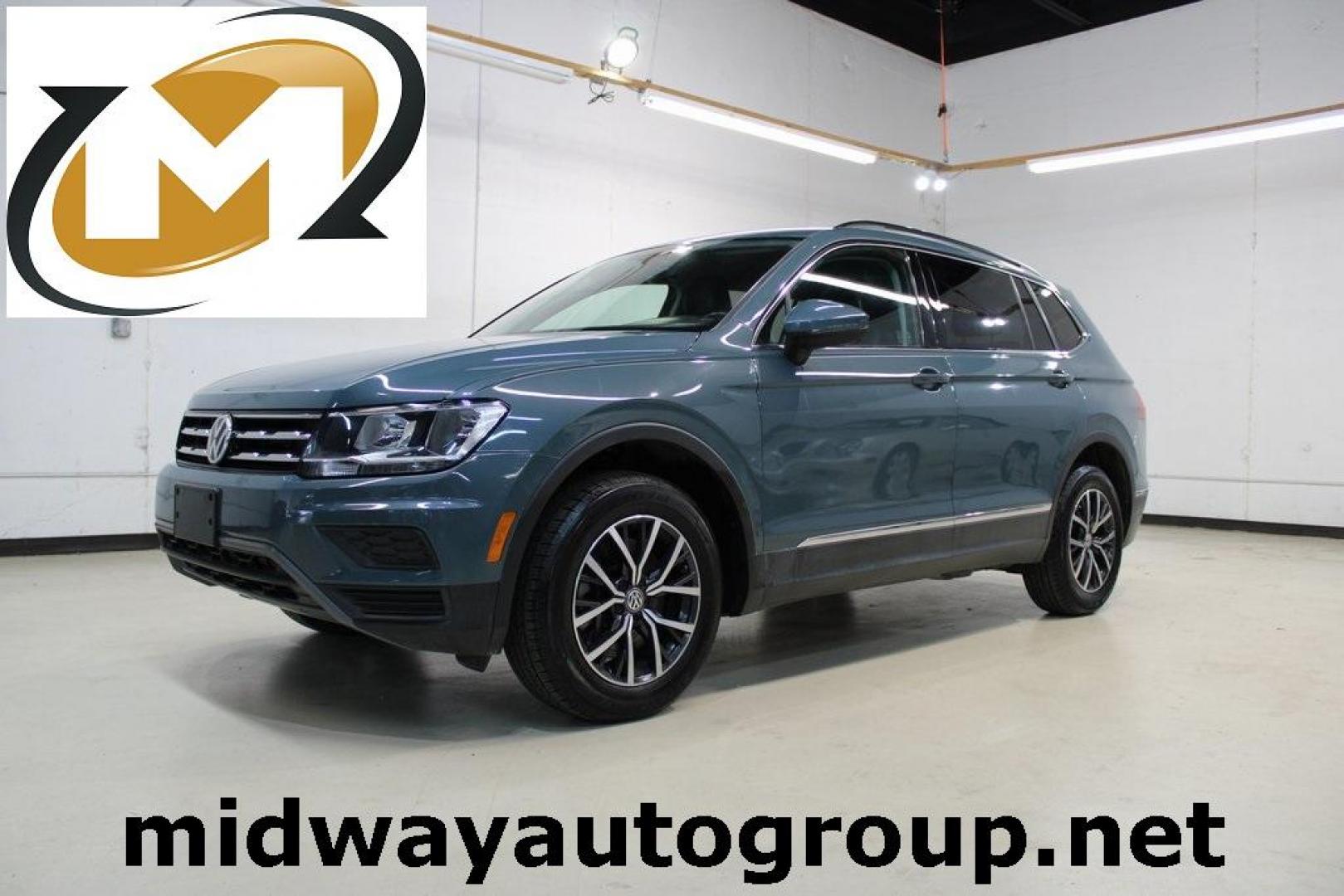 2020 Blue /Saffrano Orange and Black Volkswagen Tiguan 2.0T SE (3VV3B7AX4LM) with an 2.0L TSI DOHC engine, Automatic transmission, located at 15300 Midway Rd., Addison, TX, 75001, (972) 702-0011, 32.958321, -96.838074 - HOME OF THE NO HAGGLE PRICE - WHOLESALE PRICES TO THE PUBLIC!! Tiguan 2.0T SE, 4D Sport Utility, 2.0L TSI DOHC, 8-Speed Automatic with Tiptronic, FWD, Blue.<br><br>Blue 2020 Volkswagen Tiguan 2.0T SE<br><br>Recent Arrival! 22/29 City/Highway MPG<br><br><br>At Midway Auto Group, we strive to provide - Photo#0