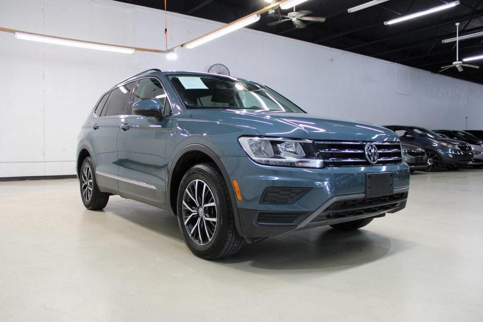 2020 Blue /Saffrano Orange and Black Volkswagen Tiguan 2.0T SE (3VV3B7AX4LM) with an 2.0L TSI DOHC engine, Automatic transmission, located at 15300 Midway Rd., Addison, TX, 75001, (972) 702-0011, 32.958321, -96.838074 - HOME OF THE NO HAGGLE PRICE - WHOLESALE PRICES TO THE PUBLIC!! Tiguan 2.0T SE, 4D Sport Utility, 2.0L TSI DOHC, 8-Speed Automatic with Tiptronic, FWD, Blue.<br><br>Blue 2020 Volkswagen Tiguan 2.0T SE<br><br>Recent Arrival! 22/29 City/Highway MPG<br><br><br>At Midway Auto Group, we strive to provide - Photo#1