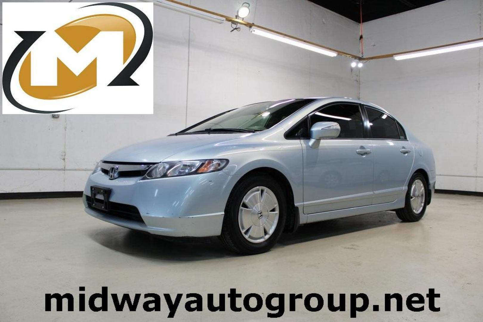 2008 Fiji Blue Pearl /Gray Honda Civic Hybrid (JHMFA36298S) with an 1.3L I4 SOHC engine, CVT transmission, located at 15300 Midway Rd., Addison, TX, 75001, (972) 702-0011, 32.958321, -96.838074 - HOME OF THE NO HAGGLE PRICE - WHOLESALE PRICES TO THE PUBLIC!! Civic Hybrid, 4D Sedan, 1.3L I4 SOHC, CVT, FWD, Cloth.<br><br>2008 Honda Civic Hybrid<br><br>Recent Arrival! 40/45 City/Highway MPG<br><br>Awards:<br> * 2008 KBB.com Brand Image Awards<br>Kelley Blue Book Brand Image Awards are based on - Photo#0