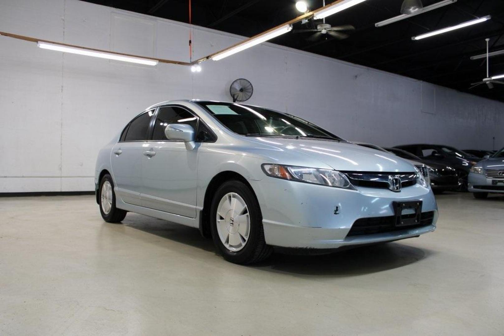 2008 Fiji Blue Pearl /Gray Honda Civic Hybrid (JHMFA36298S) with an 1.3L I4 SOHC engine, CVT transmission, located at 15300 Midway Rd., Addison, TX, 75001, (972) 702-0011, 32.958321, -96.838074 - HOME OF THE NO HAGGLE PRICE - WHOLESALE PRICES TO THE PUBLIC!! Civic Hybrid, 4D Sedan, 1.3L I4 SOHC, CVT, FWD, Cloth.<br><br>2008 Honda Civic Hybrid<br><br>Recent Arrival! 40/45 City/Highway MPG<br><br>Awards:<br> * 2008 KBB.com Brand Image Awards<br>Kelley Blue Book Brand Image Awards are based on - Photo#1