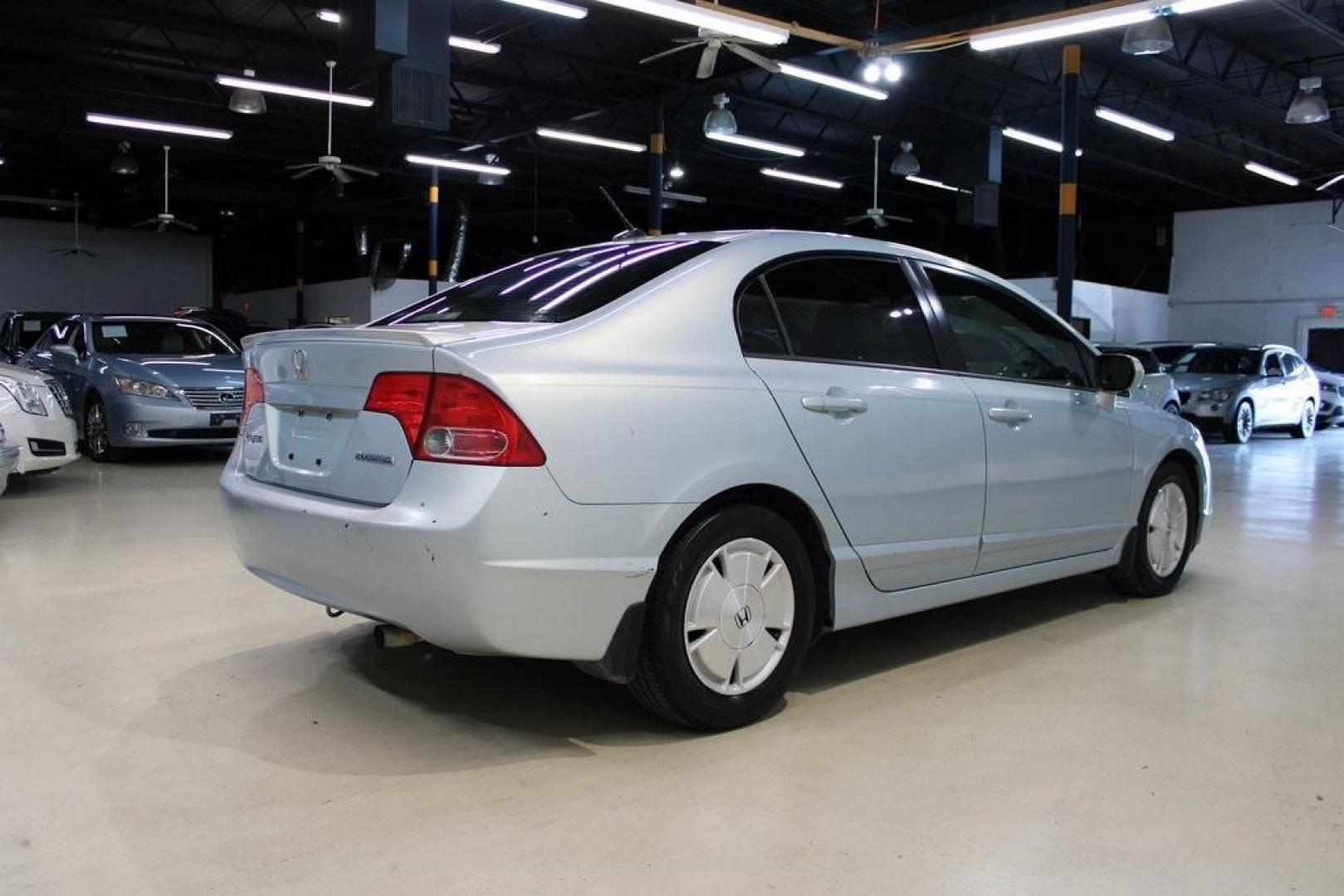 2008 Fiji Blue Pearl /Gray Honda Civic Hybrid (JHMFA36298S) with an 1.3L I4 SOHC engine, CVT transmission, located at 15300 Midway Rd., Addison, TX, 75001, (972) 702-0011, 32.958321, -96.838074 - HOME OF THE NO HAGGLE PRICE - WHOLESALE PRICES TO THE PUBLIC!! Civic Hybrid, 4D Sedan, 1.3L I4 SOHC, CVT, FWD, Cloth.<br><br>2008 Honda Civic Hybrid<br><br>Recent Arrival! 40/45 City/Highway MPG<br><br>Awards:<br> * 2008 KBB.com Brand Image Awards<br>Kelley Blue Book Brand Image Awards are based on - Photo#2