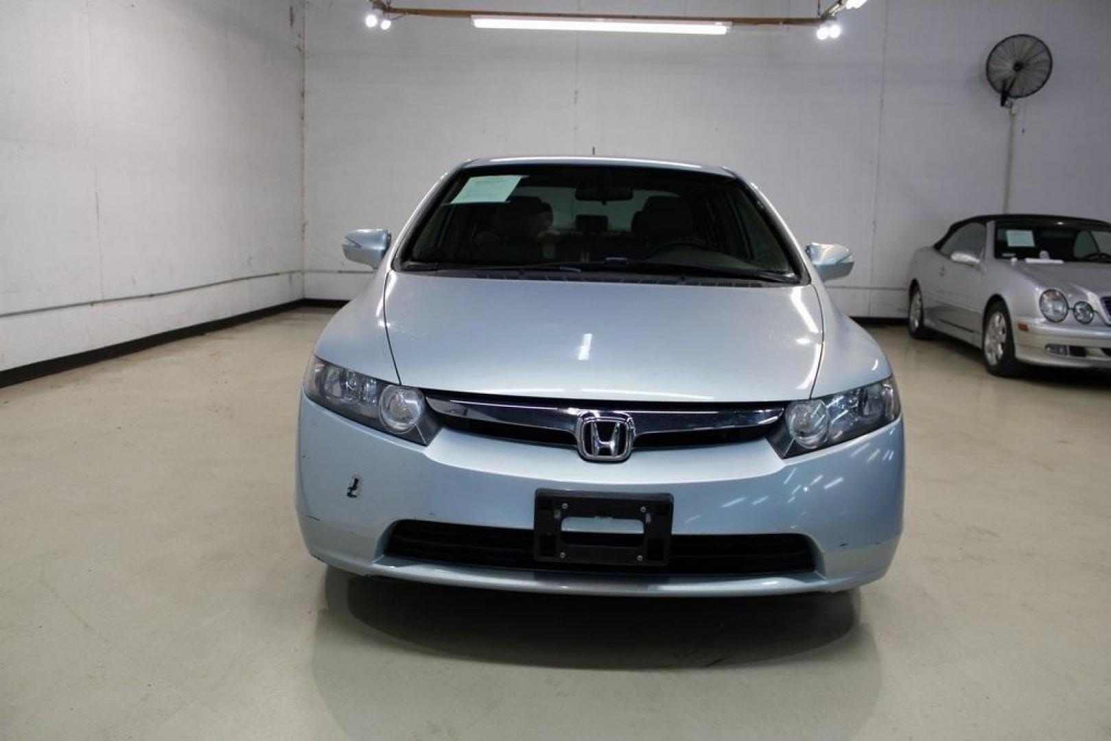 2008 Fiji Blue Pearl /Gray Honda Civic Hybrid (JHMFA36298S) with an 1.3L I4 SOHC engine, CVT transmission, located at 15300 Midway Rd., Addison, TX, 75001, (972) 702-0011, 32.958321, -96.838074 - HOME OF THE NO HAGGLE PRICE - WHOLESALE PRICES TO THE PUBLIC!! Civic Hybrid, 4D Sedan, 1.3L I4 SOHC, CVT, FWD, Cloth.<br><br>2008 Honda Civic Hybrid<br><br>Recent Arrival! 40/45 City/Highway MPG<br><br>Awards:<br> * 2008 KBB.com Brand Image Awards<br>Kelley Blue Book Brand Image Awards are based on - Photo#5