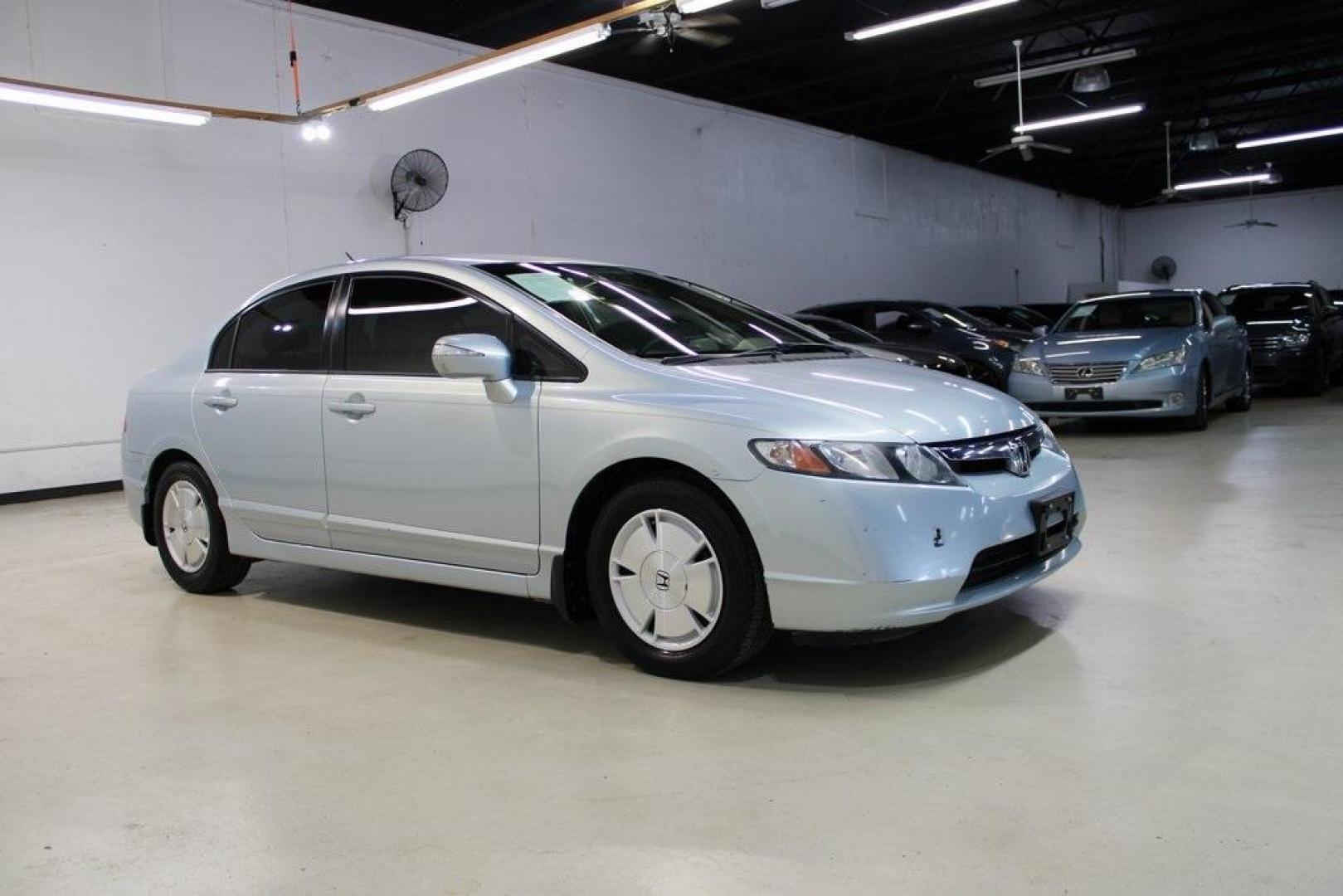 2008 Fiji Blue Pearl /Gray Honda Civic Hybrid (JHMFA36298S) with an 1.3L I4 SOHC engine, CVT transmission, located at 15300 Midway Rd., Addison, TX, 75001, (972) 702-0011, 32.958321, -96.838074 - HOME OF THE NO HAGGLE PRICE - WHOLESALE PRICES TO THE PUBLIC!! Civic Hybrid, 4D Sedan, 1.3L I4 SOHC, CVT, FWD, Cloth.<br><br>2008 Honda Civic Hybrid<br><br>Recent Arrival! 40/45 City/Highway MPG<br><br>Awards:<br> * 2008 KBB.com Brand Image Awards<br>Kelley Blue Book Brand Image Awards are based on - Photo#6