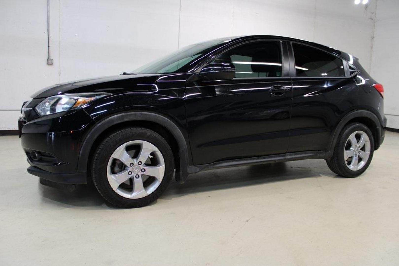 2016 Crystal Black Pearl Honda HR-V EX (3CZRU5G52GM) with an 1.8L I4 SOHC 16V i-VTEC engine, Manual transmission, located at 15300 Midway Rd., Addison, TX, 75001, (972) 702-0011, 32.958321, -96.838074 - Photo#4