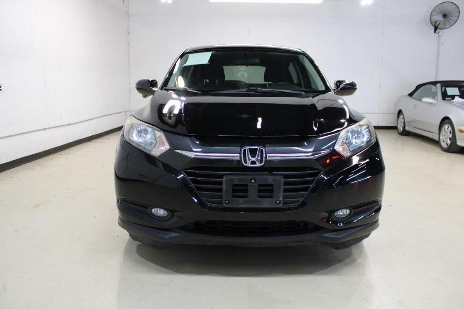 2016 Crystal Black Pearl Honda HR-V EX (3CZRU5G52GM) with an 1.8L I4 SOHC 16V i-VTEC engine, Manual transmission, located at 15300 Midway Rd., Addison, TX, 75001, (972) 702-0011, 32.958321, -96.838074 - Photo#5