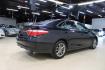 2016 Midnight Black Metallic /Ash/Black Toyota Camry SE (4T1BF1FK4GU) with an 2.5L I4 SMPI DOHC engine, Automatic transmission, located at 15300 Midway Rd., Addison, TX, 75001, (972) 702-0011, 32.958321, -96.838074 - HOME OF THE NO HAGGLE PRICE - WHOLESALE PRICES TO THE PUBLIC!! Camry SE, 4D Sedan, 2.5L I4 SMPI DOHC, 6-Speed Automatic, FWD, Ash/Black Cloth.<br><br>Midnight Black Metallic 2016 Toyota Camry SE<br><br>25/35 City/Highway MPG<br><br>Awards:<br> * 2016 KBB.com 10 Most Awarded Cars * 2016 KBB.com 5- - Photo#2