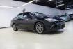 2016 Midnight Black Metallic /Ash/Black Toyota Camry SE (4T1BF1FK4GU) with an 2.5L I4 SMPI DOHC engine, Automatic transmission, located at 15300 Midway Rd., Addison, TX, 75001, (972) 702-0011, 32.958321, -96.838074 - HOME OF THE NO HAGGLE PRICE - WHOLESALE PRICES TO THE PUBLIC!! Camry SE, 4D Sedan, 2.5L I4 SMPI DOHC, 6-Speed Automatic, FWD, Ash/Black Cloth.<br><br>Midnight Black Metallic 2016 Toyota Camry SE<br><br>25/35 City/Highway MPG<br><br>Awards:<br> * 2016 KBB.com 10 Most Awarded Cars * 2016 KBB.com 5- - Photo#6