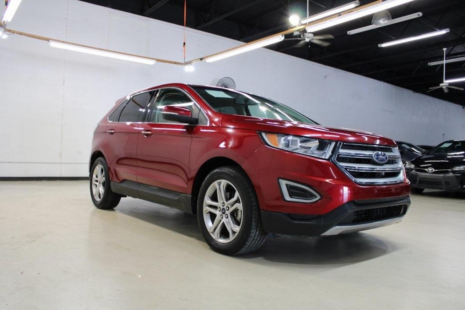 2017 Red /Ebony Ford Edge Titanium (2FMPK3K91HB) with an EcoBoost 2.0L I4 GTDi DOHC Turbocharged VCT engine, Automatic transmission, located at 15300 Midway Rd., Addison, TX, 75001, (972) 702-0011, 32.958321, -96.838074 - Photo#1