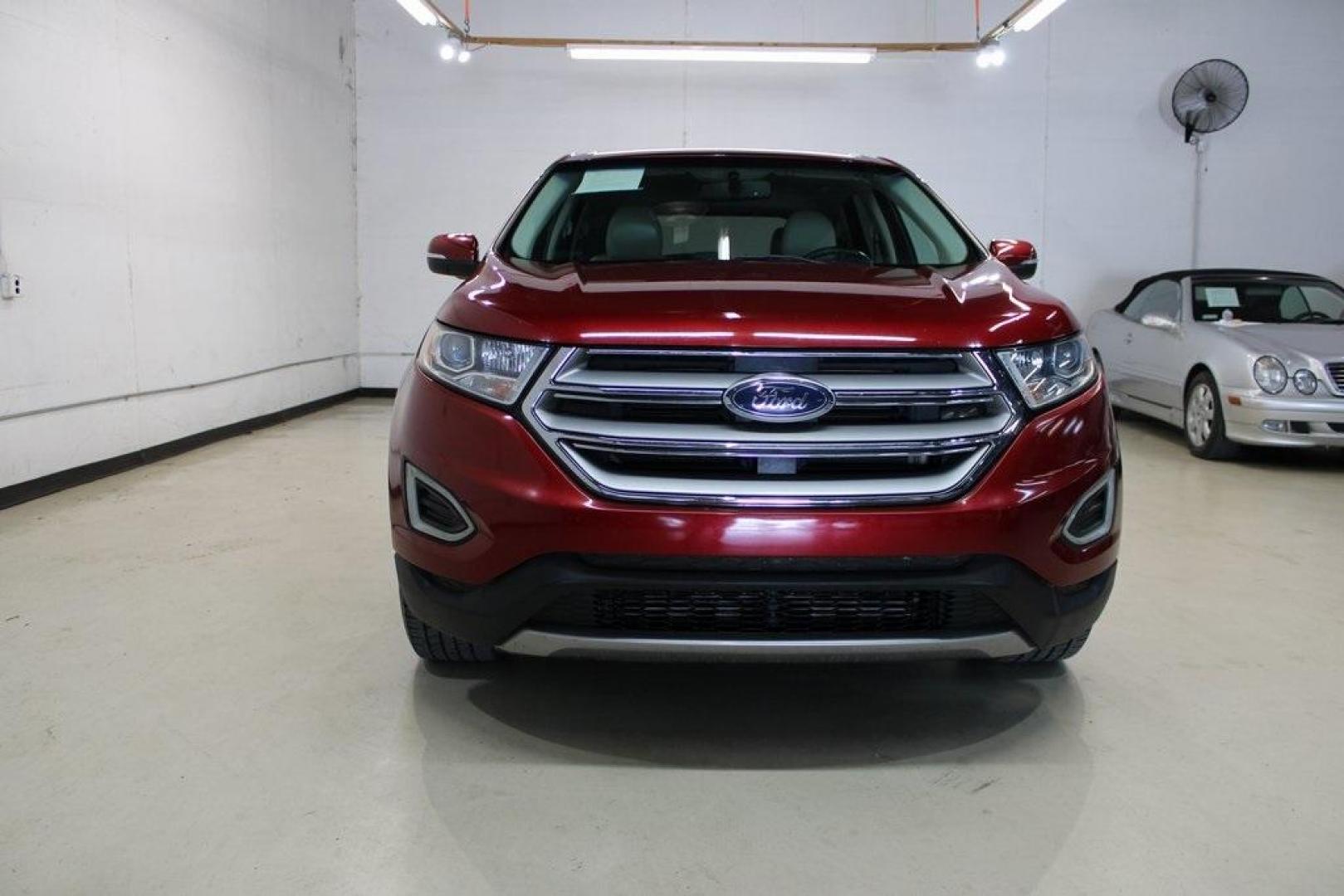 2017 Red /Ebony Ford Edge Titanium (2FMPK3K91HB) with an EcoBoost 2.0L I4 GTDi DOHC Turbocharged VCT engine, Automatic transmission, located at 15300 Midway Rd., Addison, TX, 75001, (972) 702-0011, 32.958321, -96.838074 - Photo#6