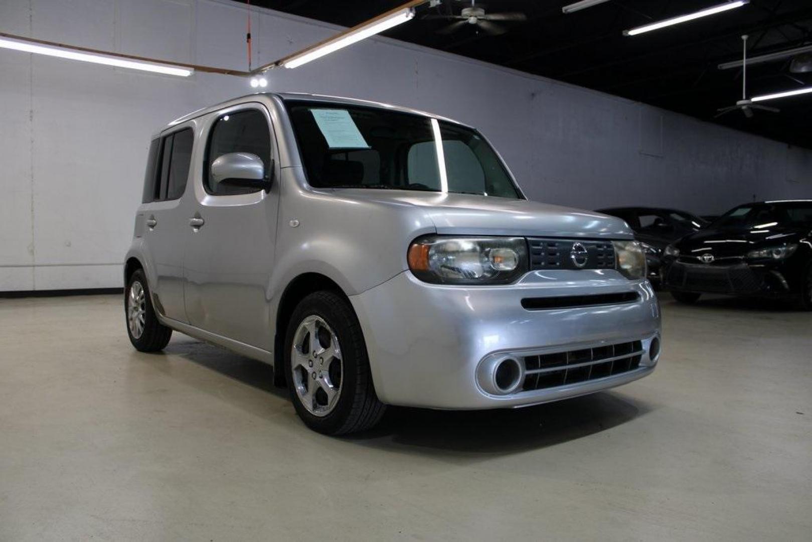 2011 Chrome Silver Metallic /Black Nissan Cube 1.8 S (JN8AZ2KRXBT) with an 1.8L 4-Cylinder DOHC 16V engine, CVT transmission, located at 15300 Midway Rd., Addison, TX, 75001, (972) 702-0011, 32.958321, -96.838074 - HOME OF THE NO HAGGLE PRICE - WHOLESALE PRICES TO THE PUBLIC!! Cube 1.8 S, 4D Wagon, 1.8L 4-Cylinder DOHC 16V, CVT with Xtronic, FWD, Chrome Silver Metallic, Black Cloth.<br><br>Chrome Silver Metallic 2011 Nissan Cube 1.8 S<br><br>27/31 City/Highway MPG<br><br>Awards:<br> * 2011 KBB.com Top 10 Cool - Photo#1