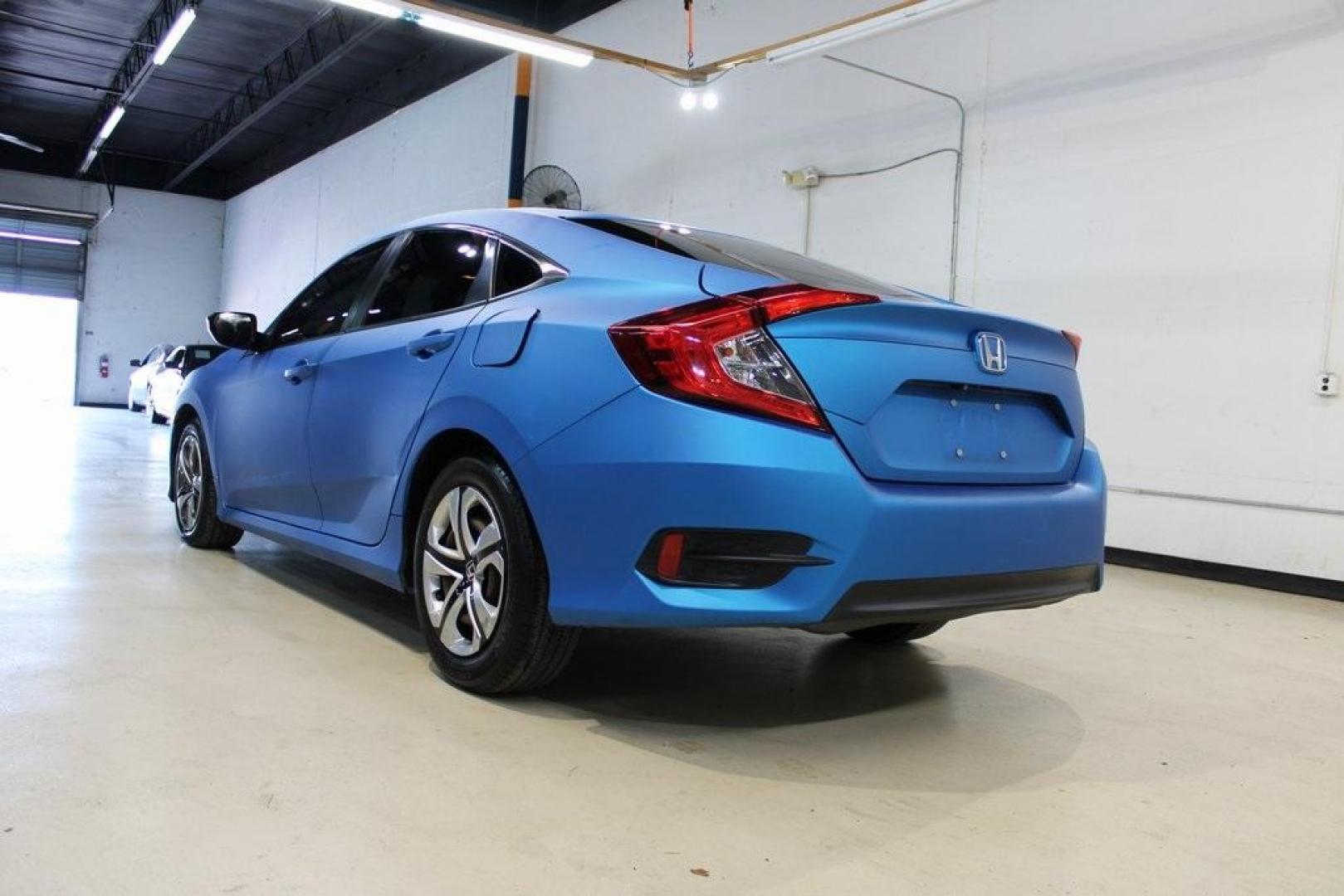 2016 Modern Steel Metallic /Gray Honda Civic LX (19XFC2F59GE) with an 2.0L I4 DOHC 16V i-VTEC engine, CVT transmission, located at 15300 Midway Rd., Addison, TX, 75001, (972) 702-0011, 32.958321, -96.838074 - HOME OF THE NO HAGGLE PRICE - WHOLESALE PRICES TO THE PUBLIC!! Civic LX, 4D Sedan, 2.0L I4 DOHC 16V i-VTEC, CVT, FWD, Gray, Gray Cloth.<br><br>Gray 2016 Honda Civic LX<br><br>31/41 City/Highway MPG<br><br>Awards:<br> * 2016 IIHS Top Safety Pick+ (When equipped with honda sensing) * NACTOY 2016 No - Photo#3