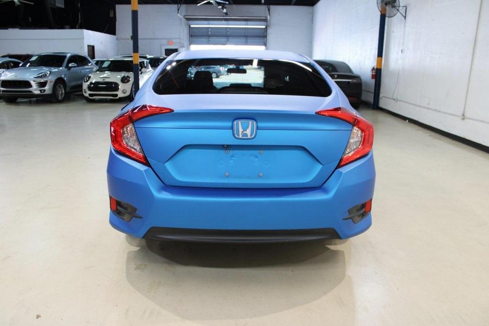 2016 Modern Steel Metallic /Gray Honda Civic LX (19XFC2F59GE) with an 2.0L I4 DOHC 16V i-VTEC engine, CVT transmission, located at 15300 Midway Rd., Addison, TX, 75001, (972) 702-0011, 32.958321, -96.838074 - HOME OF THE NO HAGGLE PRICE - WHOLESALE PRICES TO THE PUBLIC!! Civic LX, 4D Sedan, 2.0L I4 DOHC 16V i-VTEC, CVT, FWD, Gray, Gray Cloth.<br><br>Gray 2016 Honda Civic LX<br><br>31/41 City/Highway MPG<br><br>Awards:<br> * 2016 IIHS Top Safety Pick+ (When equipped with honda sensing) * NACTOY 2016 No - Photo#7