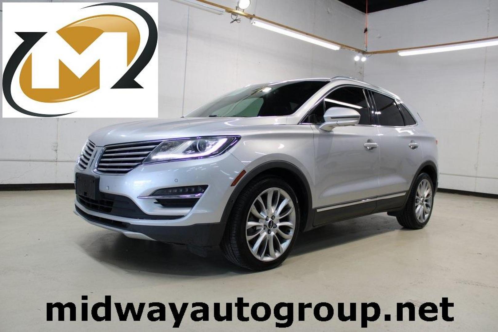 2015 Silver /Island Lincoln MKC Base (5LMCJ1A90FU) with an EcoBoost 2.0L I4 GTDi DOHC Turbocharged VCT engine, Automatic transmission, located at 15300 Midway Rd., Addison, TX, 75001, (972) 702-0011, 32.958321, -96.838074 - HOME OF THE NO HAGGLE PRICE - WHOLESALE PRICES TO THE PUBLIC!! ABS brakes, Alloy wheels, Compass, Electronic Stability Control, Front dual zone A/C, Heated door mirrors, Heated front seats, Illuminated entry, Low tire pressure warning, Remote keyless entry, Traction control.<br><br>Silver 2015 Linco - Photo#0