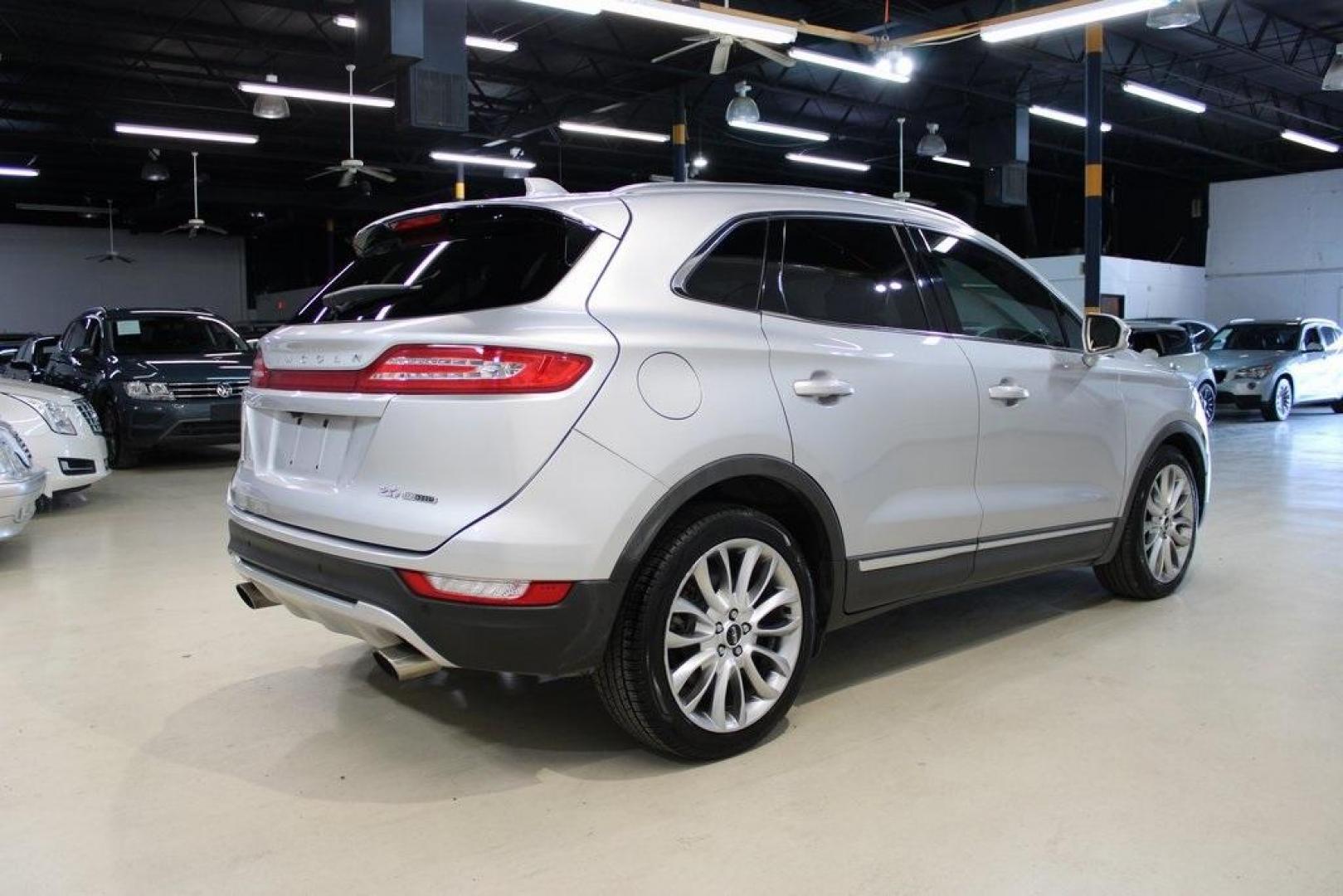 2015 Silver /Island Lincoln MKC Base (5LMCJ1A90FU) with an EcoBoost 2.0L I4 GTDi DOHC Turbocharged VCT engine, Automatic transmission, located at 15300 Midway Rd., Addison, TX, 75001, (972) 702-0011, 32.958321, -96.838074 - HOME OF THE NO HAGGLE PRICE - WHOLESALE PRICES TO THE PUBLIC!! ABS brakes, Alloy wheels, Compass, Electronic Stability Control, Front dual zone A/C, Heated door mirrors, Heated front seats, Illuminated entry, Low tire pressure warning, Remote keyless entry, Traction control.<br><br>Silver 2015 Linco - Photo#2