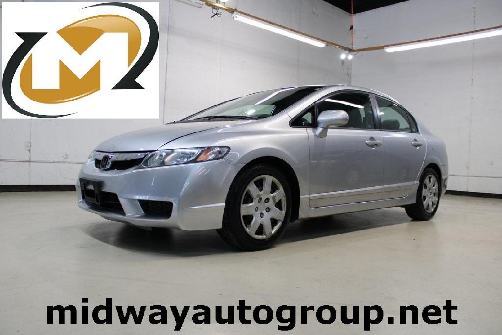 2009 Alabaster Silver Metallic Honda Civic LX (2HGFA16539H) with an 1.8L I4 SOHC 16V i-VTEC engine, Automatic transmission, located at 15300 Midway Rd., Addison, TX, 75001, (972) 702-0011, 32.958321, -96.838074 - Photo#0