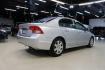 2009 Alabaster Silver Metallic Honda Civic LX (2HGFA16539H) with an 1.8L I4 SOHC 16V i-VTEC engine, Automatic transmission, located at 15300 Midway Rd., Addison, TX, 75001, (972) 702-0011, 32.958321, -96.838074 - Photo#2