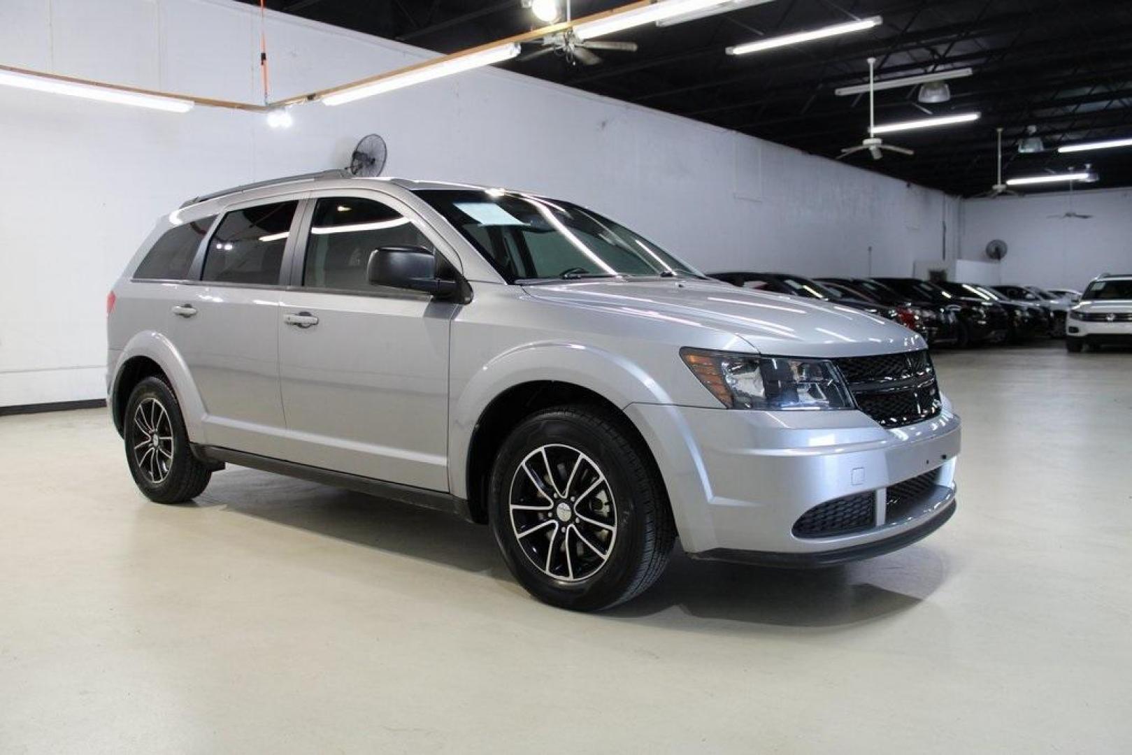 2017 Billet Clearcoat /Black Dodge Journey SE (3C4PDCAB8HT) with an 2.4L I4 DOHC 16V Dual VVT engine, Automatic transmission, located at 15300 Midway Rd., Addison, TX, 75001, (972) 702-0011, 32.958321, -96.838074 - HOME OF THE NO HAGGLE PRICE - WHOLESALE PRICES TO THE PUBLIC!! Journey SE, 4D Sport Utility, 2.4L I4 DOHC 16V Dual VVT, 4-Speed Automatic VLP, FWD, Billet Clearcoat, Black Cloth.<br><br>Billet Clearcoat 2017 Dodge Journey SE<br><br><br>At Midway Auto Group, we strive to provide you with the best qua - Photo#6