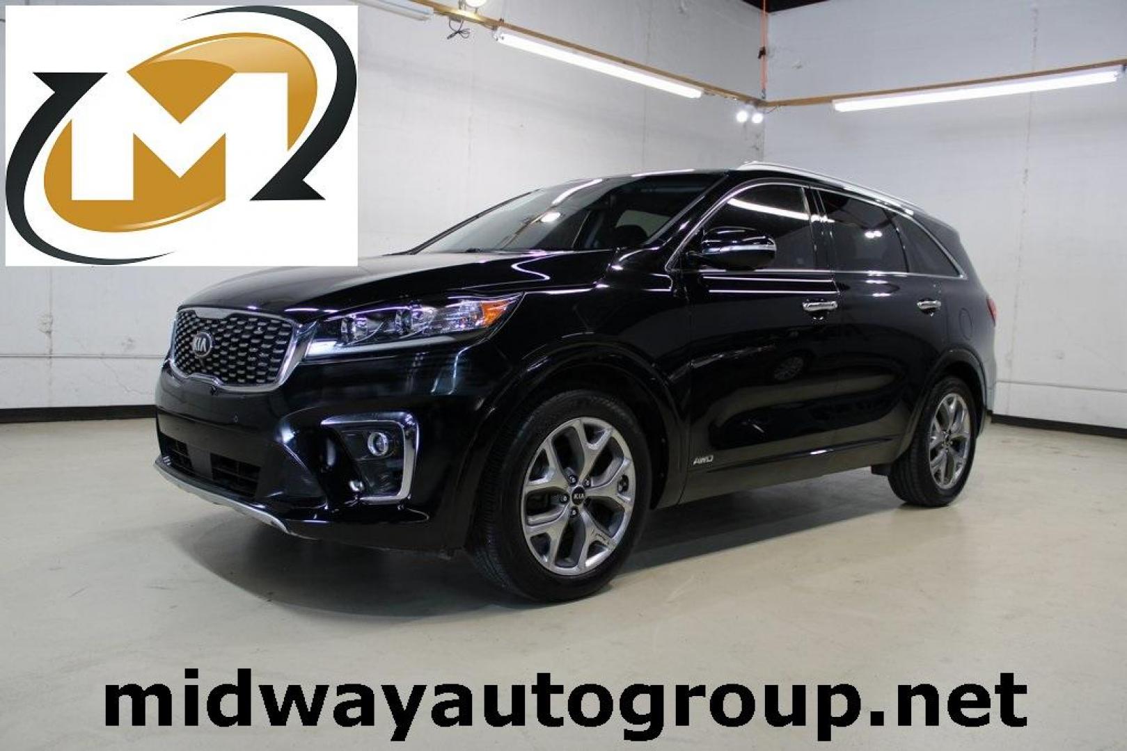 2020 Ebony Black /Black Kia Sorento SX (5XYPKDA56LG) with an V6 engine, Automatic transmission, located at 15300 Midway Rd., Addison, TX, 75001, (972) 702-0011, 32.958321, -96.838074 - HOME OF THE NO HAGGLE PRICE - WHOLESALE PRICES TO THE PUBLIC!! Bluetooth, Hands Free Connectivity, Navigation, Premium Audio, 3rd Row Seat, Backup Camera, Leather Seats, Premium Wheels, Sunroof / Moonroof, non smoker, Sorento SX, 4D Sport Utility, V6, 8-Speed Automatic, AWD, Ebony Black, Black Leath - Photo#0