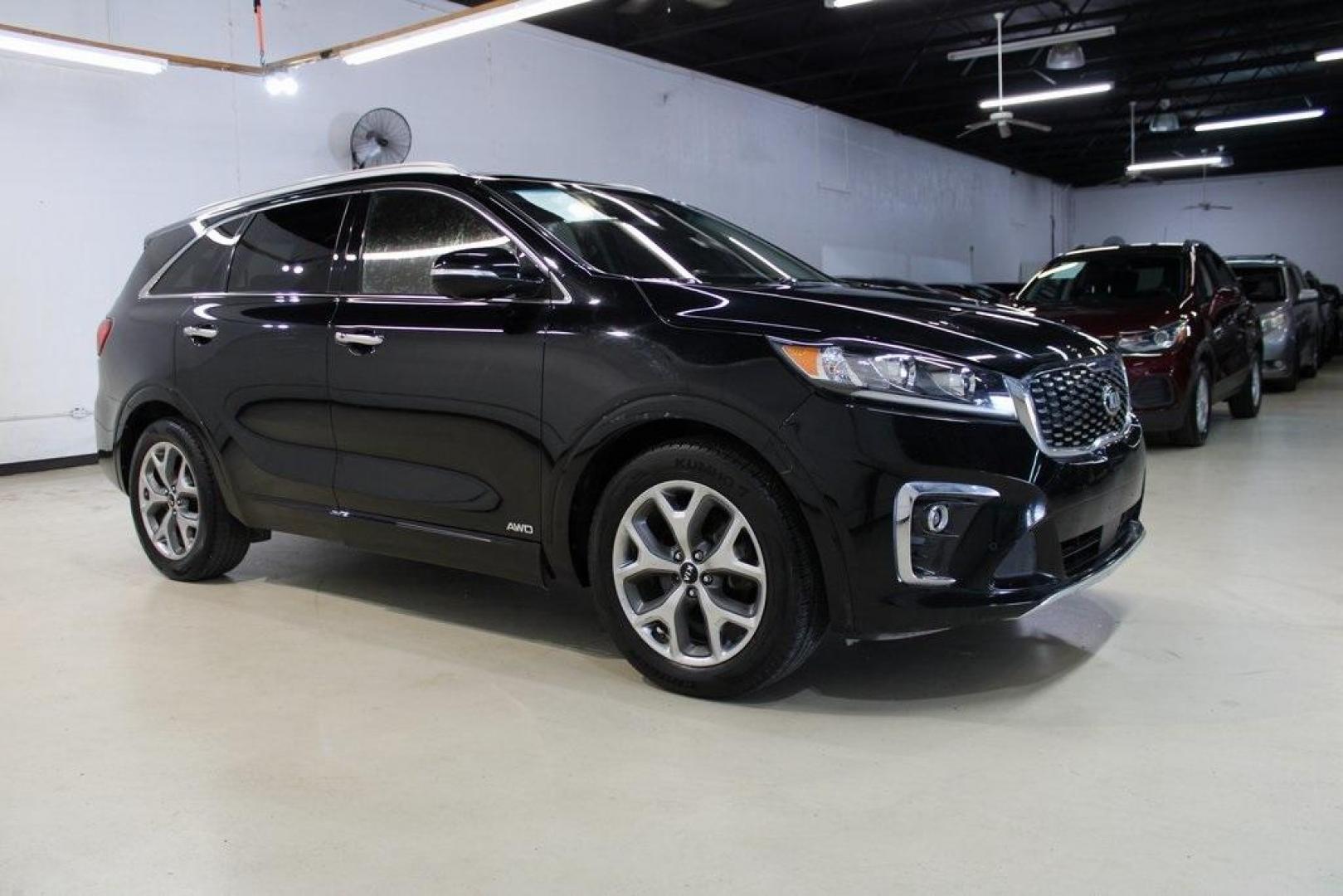 2020 Ebony Black /Black Kia Sorento SX (5XYPKDA56LG) with an V6 engine, Automatic transmission, located at 15300 Midway Rd., Addison, TX, 75001, (972) 702-0011, 32.958321, -96.838074 - HOME OF THE NO HAGGLE PRICE - WHOLESALE PRICES TO THE PUBLIC!! Bluetooth, Hands Free Connectivity, Navigation, Premium Audio, 3rd Row Seat, Backup Camera, Leather Seats, Premium Wheels, Sunroof / Moonroof, non smoker, Sorento SX, 4D Sport Utility, V6, 8-Speed Automatic, AWD, Ebony Black, Black Leath - Photo#6