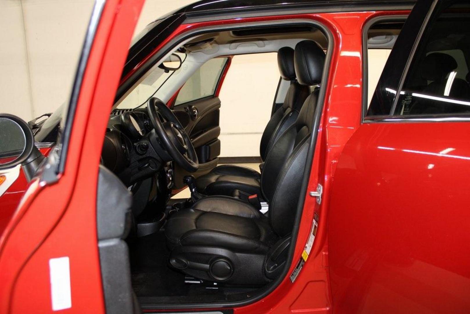 2015 Blazing Red /Carbon Black Gravity MINI Cooper Countryman Base (WMWZB3C51FW) with an 1.6L I4 DOHC 16V engine, Automatic transmission, located at 15300 Midway Rd., Addison, TX, 75001, (972) 702-0011, 32.958321, -96.838074 - HOME OF THE NO HAGGLE PRICE - WHOLESALE PRICES TO THE PUBLIC!! 4D Sport Utility, 1.6L I4 DOHC 16V, 6-Speed Automatic Steptronic, FWD, Blazing Red, Carbon Black Gravity Leather.<br><br>Blazing Red 2015 MINI Cooper Countryman<br><br>Recent Arrival! 25/30 City/Highway MPG<br><br>Awards:<br> * JD Power - Photo#14