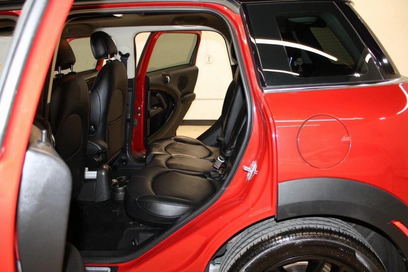 2015 Blazing Red /Carbon Black Gravity MINI Cooper Countryman Base (WMWZB3C51FW) with an 1.6L I4 DOHC 16V engine, Automatic transmission, located at 15300 Midway Rd., Addison, TX, 75001, (972) 702-0011, 32.958321, -96.838074 - HOME OF THE NO HAGGLE PRICE - WHOLESALE PRICES TO THE PUBLIC!! 4D Sport Utility, 1.6L I4 DOHC 16V, 6-Speed Automatic Steptronic, FWD, Blazing Red, Carbon Black Gravity Leather.<br><br>Blazing Red 2015 MINI Cooper Countryman<br><br>Recent Arrival! 25/30 City/Highway MPG<br><br>Awards:<br> * JD Power - Photo#16