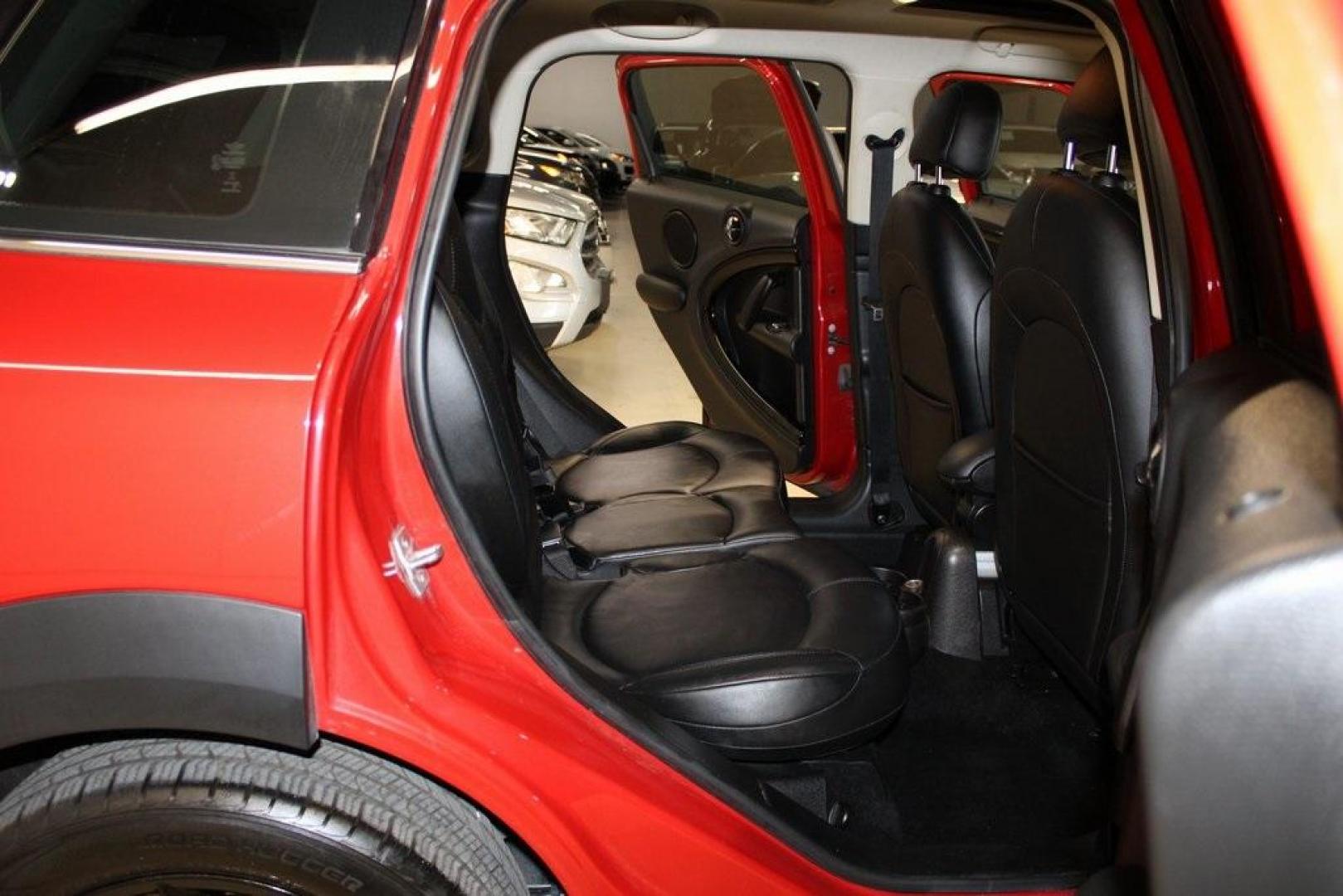 2015 Blazing Red /Carbon Black Gravity MINI Cooper Countryman Base (WMWZB3C51FW) with an 1.6L I4 DOHC 16V engine, Automatic transmission, located at 15300 Midway Rd., Addison, TX, 75001, (972) 702-0011, 32.958321, -96.838074 - HOME OF THE NO HAGGLE PRICE - WHOLESALE PRICES TO THE PUBLIC!! 4D Sport Utility, 1.6L I4 DOHC 16V, 6-Speed Automatic Steptronic, FWD, Blazing Red, Carbon Black Gravity Leather.<br><br>Blazing Red 2015 MINI Cooper Countryman<br><br>Recent Arrival! 25/30 City/Highway MPG<br><br>Awards:<br> * JD Power - Photo#17