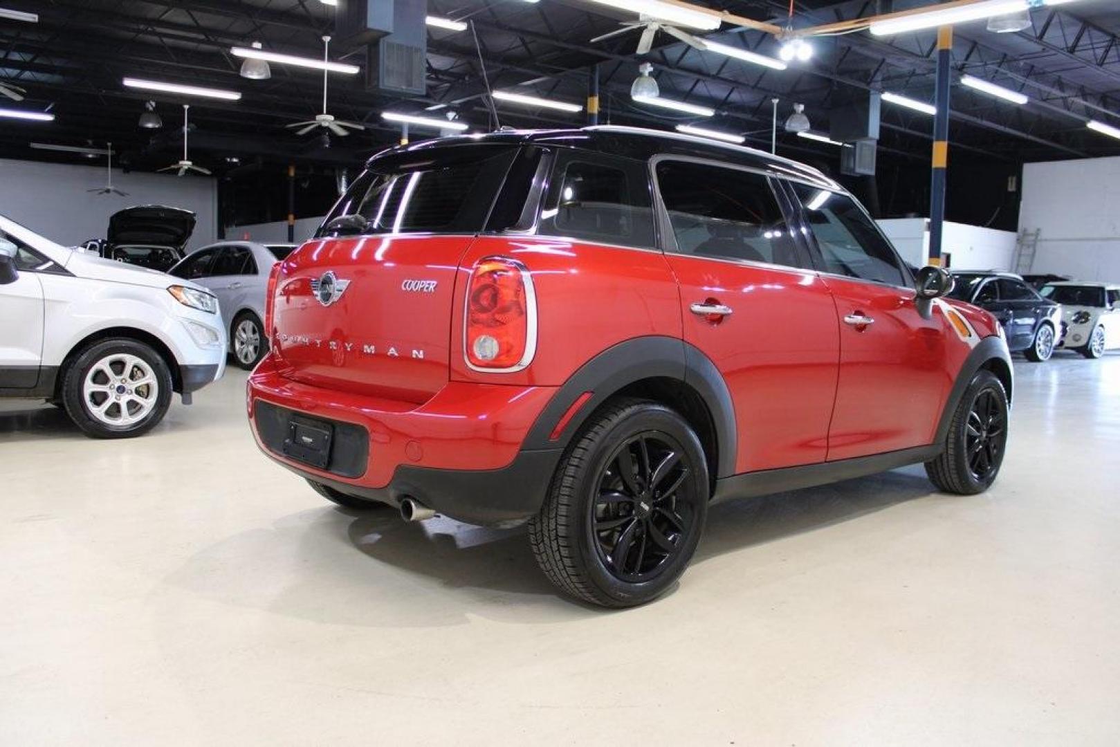 2015 Blazing Red /Carbon Black Gravity MINI Cooper Countryman Base (WMWZB3C51FW) with an 1.6L I4 DOHC 16V engine, Automatic transmission, located at 15300 Midway Rd., Addison, TX, 75001, (972) 702-0011, 32.958321, -96.838074 - HOME OF THE NO HAGGLE PRICE - WHOLESALE PRICES TO THE PUBLIC!! 4D Sport Utility, 1.6L I4 DOHC 16V, 6-Speed Automatic Steptronic, FWD, Blazing Red, Carbon Black Gravity Leather.<br><br>Blazing Red 2015 MINI Cooper Countryman<br><br>Recent Arrival! 25/30 City/Highway MPG<br><br>Awards:<br> * JD Power - Photo#2