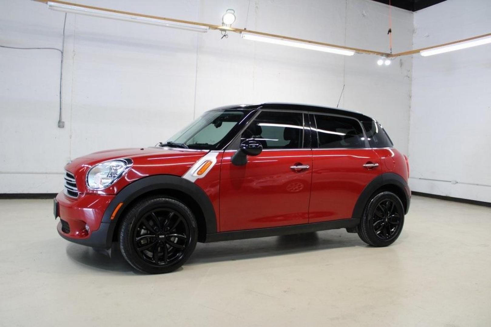 2015 Blazing Red /Carbon Black Gravity MINI Cooper Countryman Base (WMWZB3C51FW) with an 1.6L I4 DOHC 16V engine, Automatic transmission, located at 15300 Midway Rd., Addison, TX, 75001, (972) 702-0011, 32.958321, -96.838074 - HOME OF THE NO HAGGLE PRICE - WHOLESALE PRICES TO THE PUBLIC!! 4D Sport Utility, 1.6L I4 DOHC 16V, 6-Speed Automatic Steptronic, FWD, Blazing Red, Carbon Black Gravity Leather.<br><br>Blazing Red 2015 MINI Cooper Countryman<br><br>Recent Arrival! 25/30 City/Highway MPG<br><br>Awards:<br> * JD Power - Photo#4