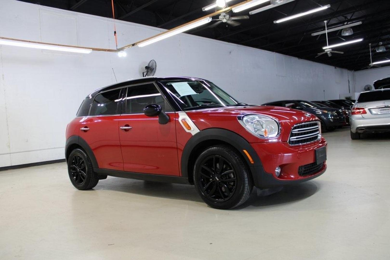 2015 Blazing Red /Carbon Black Gravity MINI Cooper Countryman Base (WMWZB3C51FW) with an 1.6L I4 DOHC 16V engine, Automatic transmission, located at 15300 Midway Rd., Addison, TX, 75001, (972) 702-0011, 32.958321, -96.838074 - HOME OF THE NO HAGGLE PRICE - WHOLESALE PRICES TO THE PUBLIC!! 4D Sport Utility, 1.6L I4 DOHC 16V, 6-Speed Automatic Steptronic, FWD, Blazing Red, Carbon Black Gravity Leather.<br><br>Blazing Red 2015 MINI Cooper Countryman<br><br>Recent Arrival! 25/30 City/Highway MPG<br><br>Awards:<br> * JD Power - Photo#6