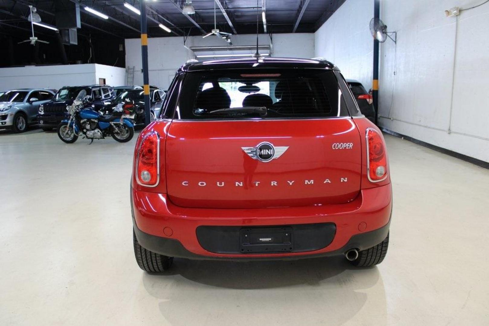 2015 Blazing Red /Carbon Black Gravity MINI Cooper Countryman Base (WMWZB3C51FW) with an 1.6L I4 DOHC 16V engine, Automatic transmission, located at 15300 Midway Rd., Addison, TX, 75001, (972) 702-0011, 32.958321, -96.838074 - HOME OF THE NO HAGGLE PRICE - WHOLESALE PRICES TO THE PUBLIC!! 4D Sport Utility, 1.6L I4 DOHC 16V, 6-Speed Automatic Steptronic, FWD, Blazing Red, Carbon Black Gravity Leather.<br><br>Blazing Red 2015 MINI Cooper Countryman<br><br>Recent Arrival! 25/30 City/Highway MPG<br><br>Awards:<br> * JD Power - Photo#7