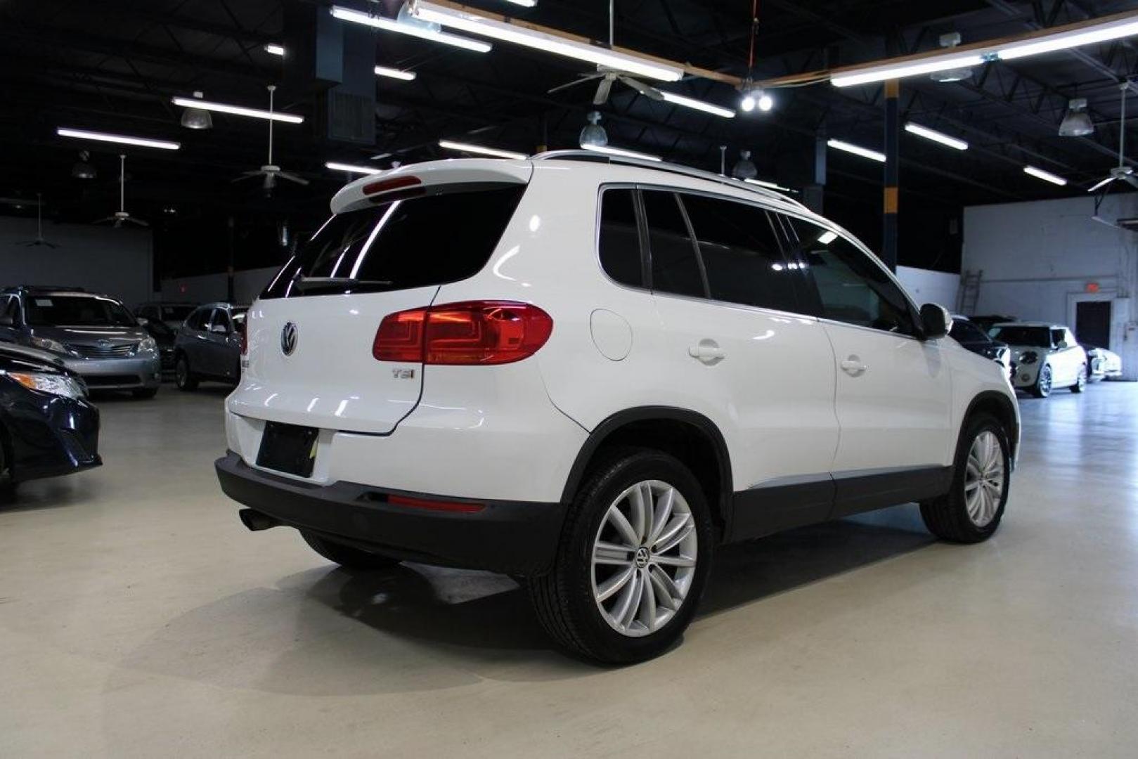 2016 Pure White Volkswagen Tiguan SE (WVGAV7AX9GW) with an 2.0L 4-Cylinder Turbocharged engine, Automatic transmission, located at 15300 Midway Rd., Addison, TX, 75001, (972) 702-0011, 32.958321, -96.838074 - Photo#2