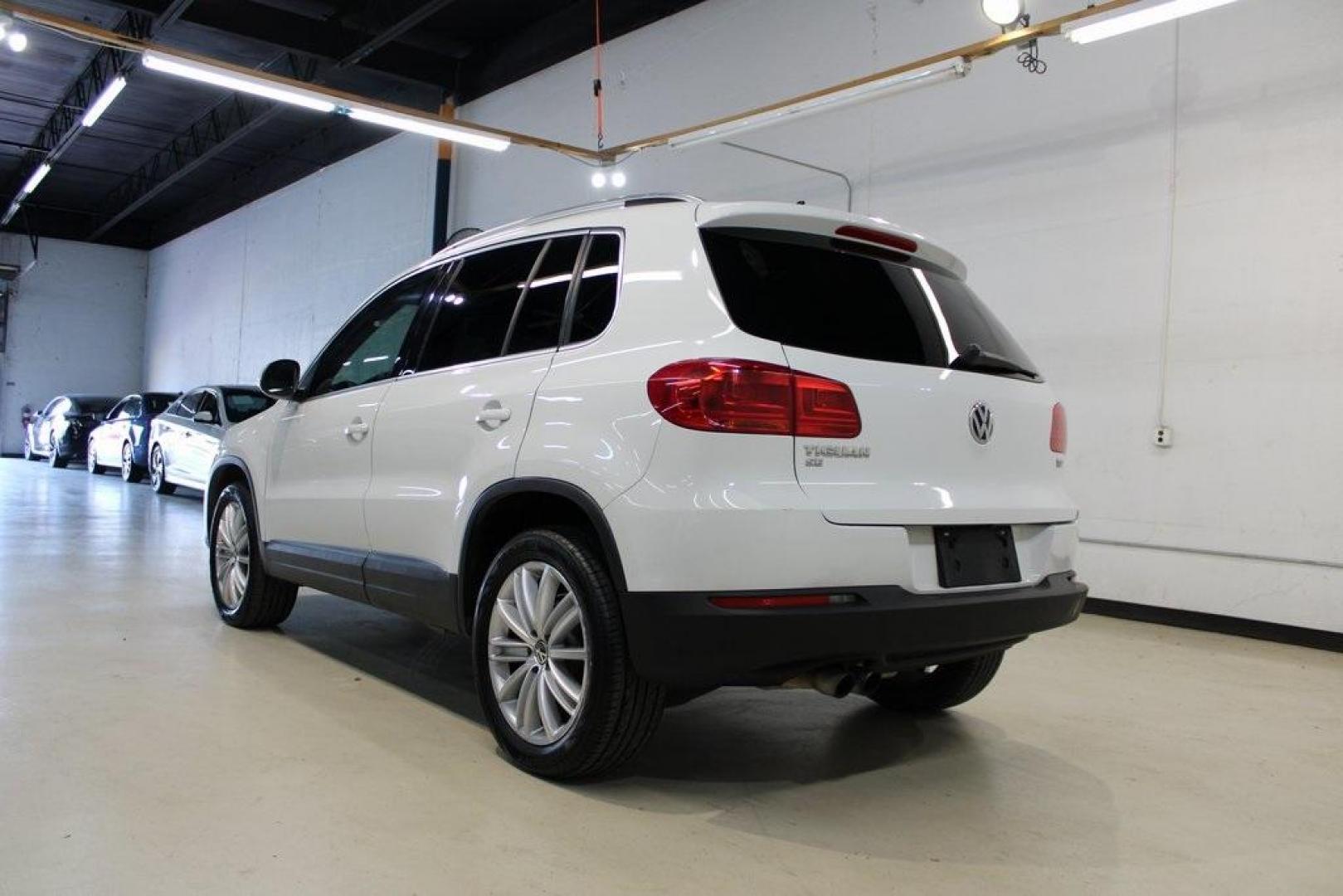 2016 Pure White Volkswagen Tiguan SE (WVGAV7AX9GW) with an 2.0L 4-Cylinder Turbocharged engine, Automatic transmission, located at 15300 Midway Rd., Addison, TX, 75001, (972) 702-0011, 32.958321, -96.838074 - Photo#3