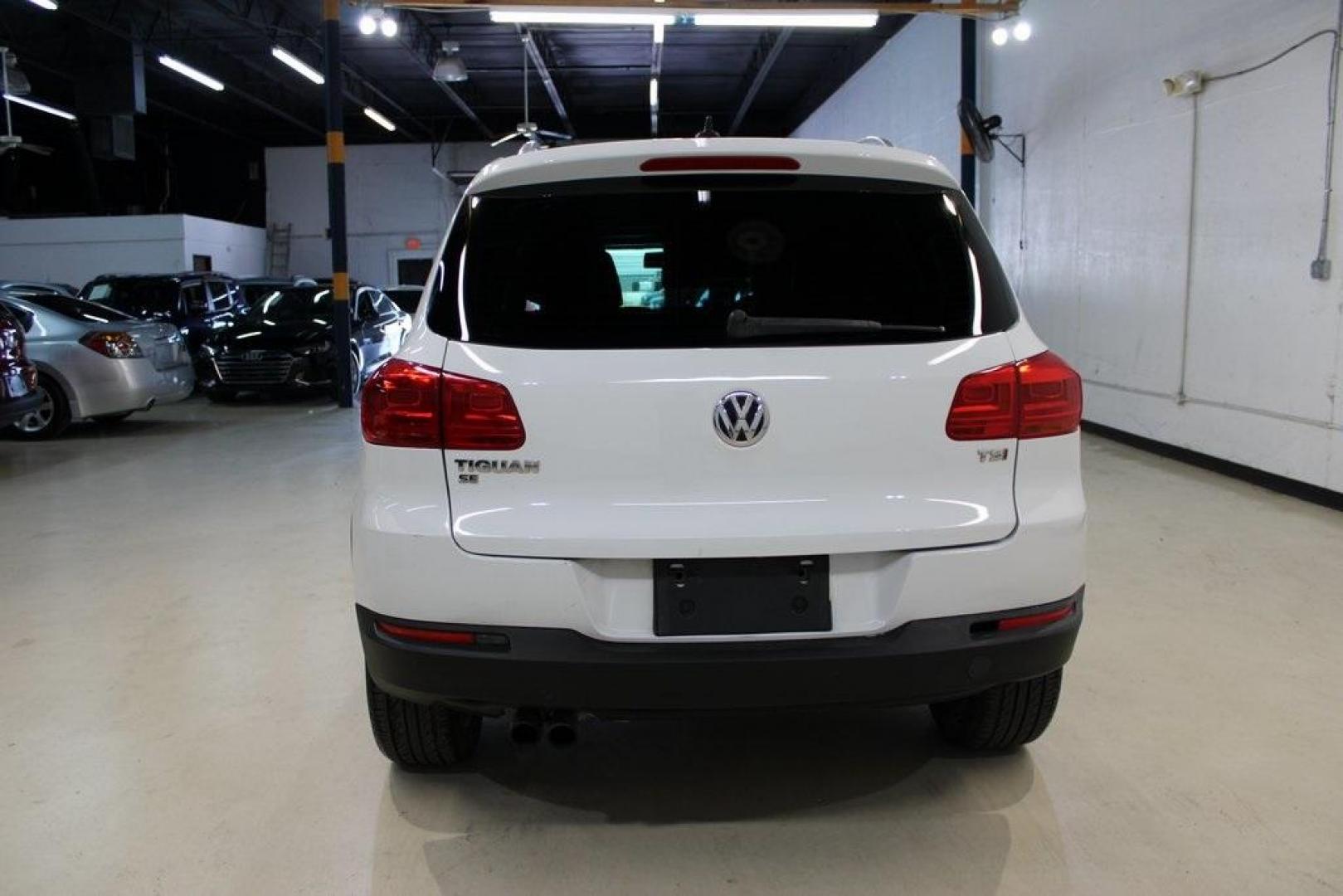 2016 Pure White Volkswagen Tiguan SE (WVGAV7AX9GW) with an 2.0L 4-Cylinder Turbocharged engine, Automatic transmission, located at 15300 Midway Rd., Addison, TX, 75001, (972) 702-0011, 32.958321, -96.838074 - Photo#7