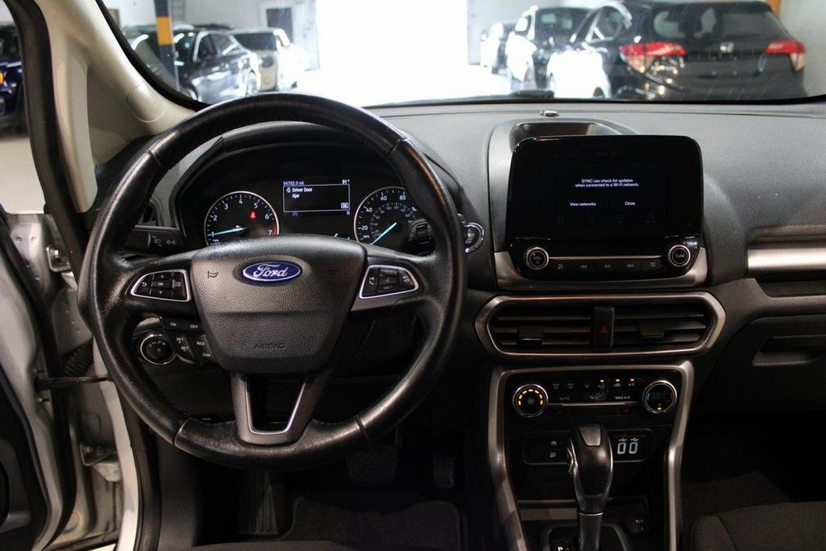 2019 Moondust /Ebony Black Ford EcoSport SE (MAJ3S2GEXKC) with an EcoBoost 1.0L I3 GTDi DOHC Turbocharged VCT engine, Automatic transmission, located at 15300 Midway Rd., Addison, TX, 75001, (972) 702-0011, 32.958321, -96.838074 - HOME OF THE NO HAGGLE PRICE - WHOLESALE PRICES TO THE PUBLIC!! EcoSport SE, 4D Sport Utility, EcoBoost 1.0L I3 GTDi DOHC Turbocharged VCT, 6-Speed Automatic, FWD, Moondust, Ebony Black Cloth.<br><br>Moondust 2019 Ford EcoSport SE<br><br>Recent Arrival! 27/29 City/Highway MPG<br><br><br>At Midway Aut - Photo#17