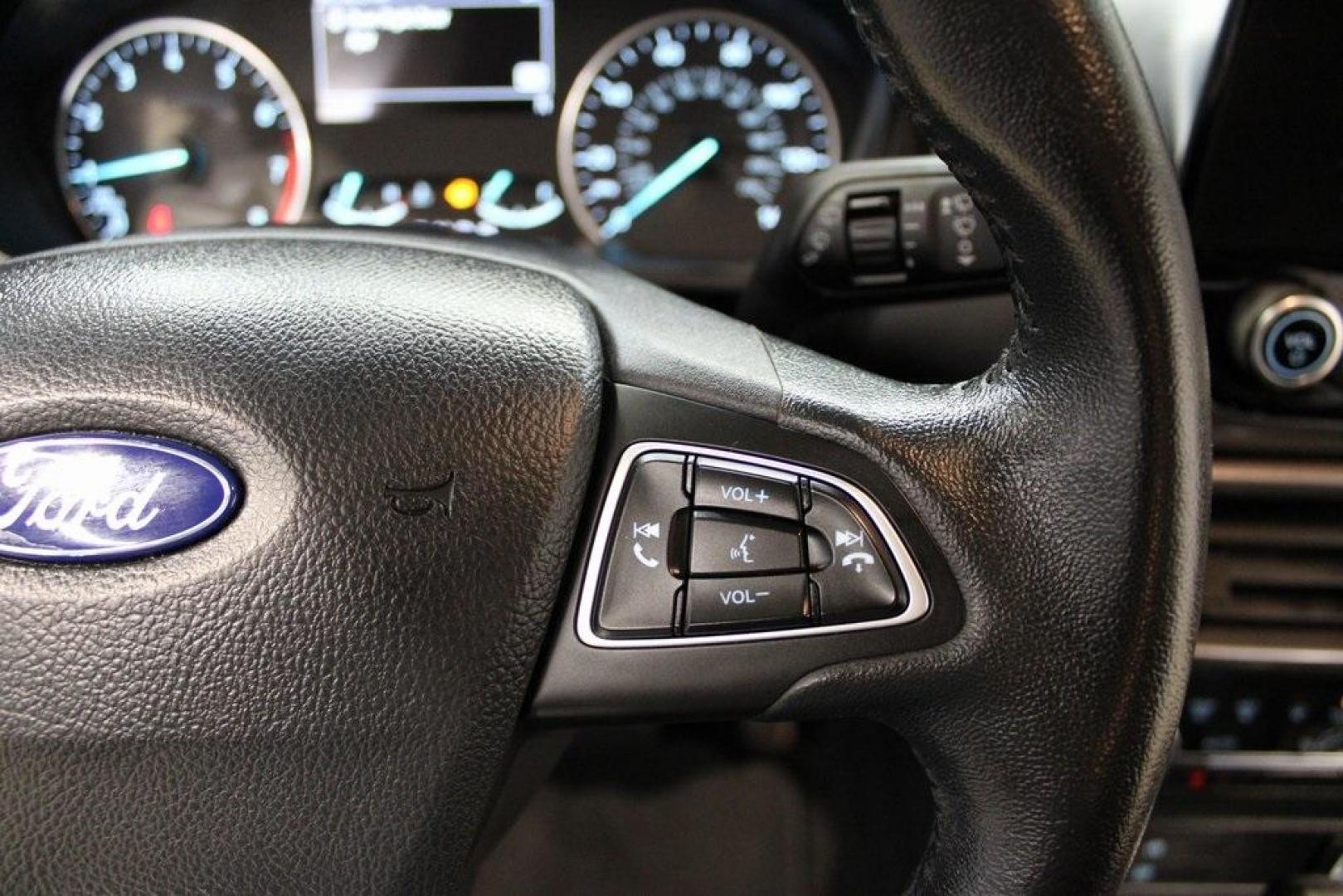 2019 Moondust /Ebony Black Ford EcoSport SE (MAJ3S2GEXKC) with an EcoBoost 1.0L I3 GTDi DOHC Turbocharged VCT engine, Automatic transmission, located at 15300 Midway Rd., Addison, TX, 75001, (972) 702-0011, 32.958321, -96.838074 - HOME OF THE NO HAGGLE PRICE - WHOLESALE PRICES TO THE PUBLIC!! EcoSport SE, 4D Sport Utility, EcoBoost 1.0L I3 GTDi DOHC Turbocharged VCT, 6-Speed Automatic, FWD, Moondust, Ebony Black Cloth.<br><br>Moondust 2019 Ford EcoSport SE<br><br>Recent Arrival! 27/29 City/Highway MPG<br><br><br>At Midway Aut - Photo#22