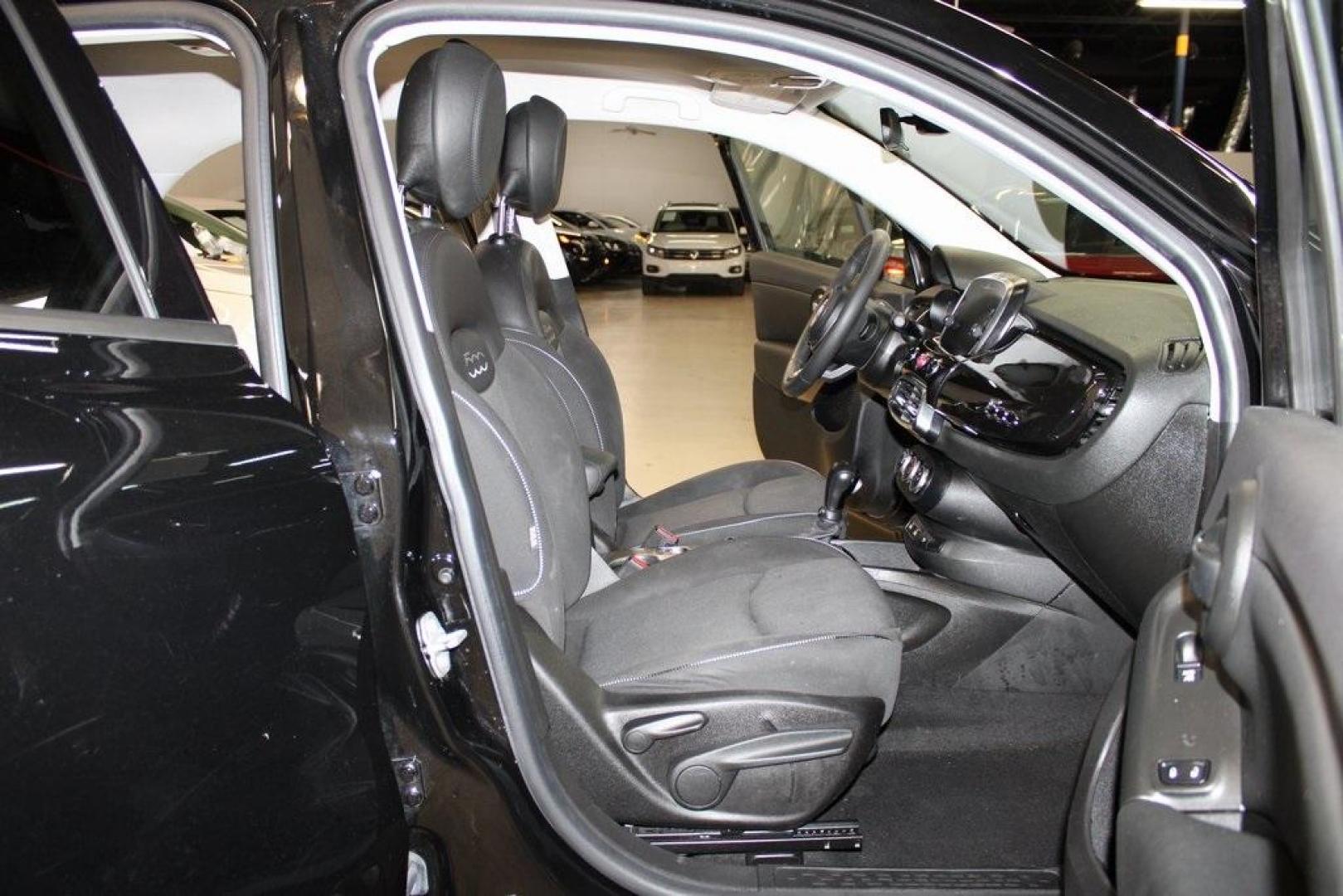 2020 Nero Cinema (Black Clearcoat) /Black Fiat 500X Pop (ZFBNFYA19LP) with an 1.3L I4 engine, Automatic transmission, located at 15300 Midway Rd., Addison, TX, 75001, (972) 702-0011, 32.958321, -96.838074 - HOME OF THE NO HAGGLE PRICE - WHOLESALE PRICES TO THE PUBLIC!! 500X Pop, 4D Sport Utility, 1.3L I4, 9-Speed 948TE Automatic, AWD, Nero Cinema (Black Clearcoat), Black Cloth.<br><br>Nero Cinema (Black Clearcoat) 2020 Fiat 500X Pop<br><br>24/30 City/Highway MPG<br><br><br>At Midway Auto Group, we stri - Photo#14