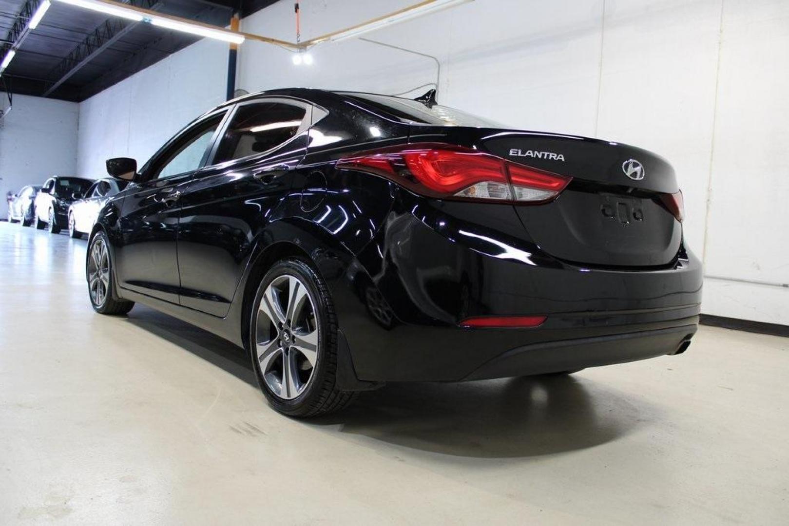 2016 Black Noir Pearl /Gray Hyundai Elantra Sport (KMHDH4AH4GU) with an 2.0L 4-Cylinder DOHC 16V engine, Manual transmission, located at 15300 Midway Rd., Addison, TX, 75001, (972) 702-0011, 32.958321, -96.838074 - HOME OF THE NO HAGGLE PRICE - WHOLESALE PRICES TO THE PUBLIC!! Elantra Sport, 4D Sedan, 2.0L 4-Cylinder DOHC 16V, 6-Speed Manual, FWD, Black Noir Pearl, Gray Cloth.<br><br>Black Noir Pearl 2016 Hyundai Elantra Sport<br><br>Recent Arrival! 24/34 City/Highway MPG<br><br>Awards:<br> * 2016 KBB.com Bes - Photo#3