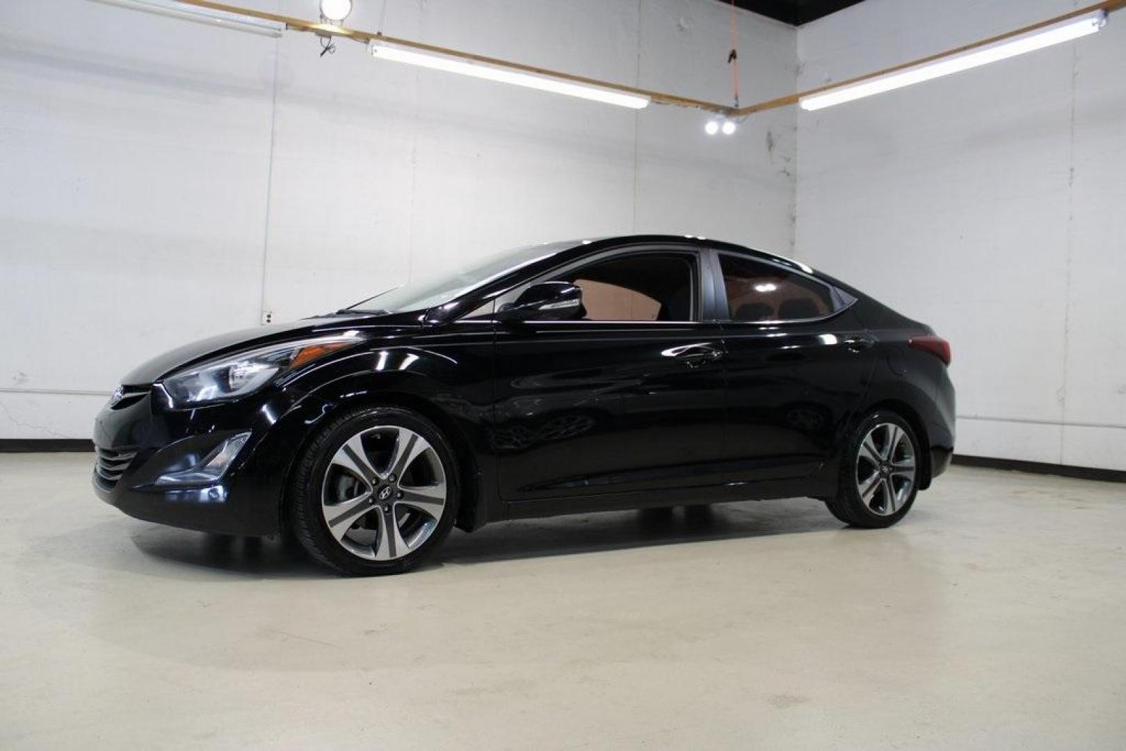 2016 Black Noir Pearl /Gray Hyundai Elantra Sport (KMHDH4AH4GU) with an 2.0L 4-Cylinder DOHC 16V engine, Manual transmission, located at 15300 Midway Rd., Addison, TX, 75001, (972) 702-0011, 32.958321, -96.838074 - HOME OF THE NO HAGGLE PRICE - WHOLESALE PRICES TO THE PUBLIC!! Elantra Sport, 4D Sedan, 2.0L 4-Cylinder DOHC 16V, 6-Speed Manual, FWD, Black Noir Pearl, Gray Cloth.<br><br>Black Noir Pearl 2016 Hyundai Elantra Sport<br><br>Recent Arrival! 24/34 City/Highway MPG<br><br>Awards:<br> * 2016 KBB.com Bes - Photo#4