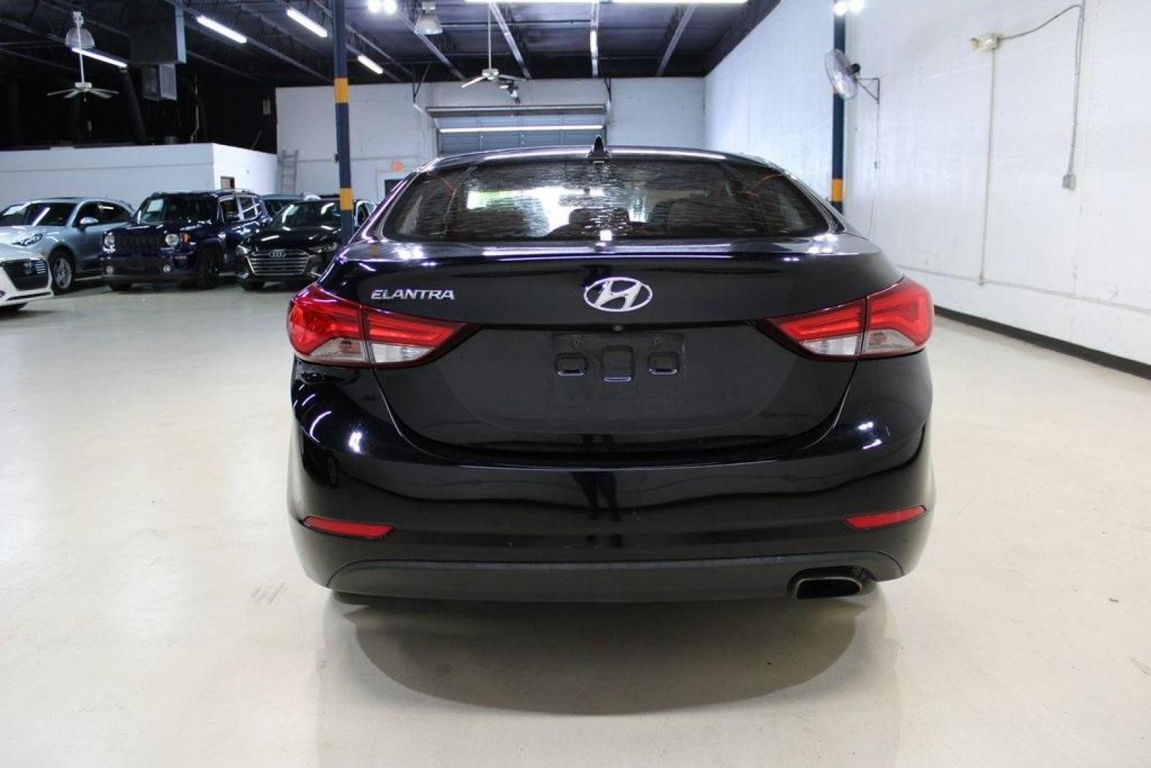 2016 Black Noir Pearl /Gray Hyundai Elantra Sport (KMHDH4AH4GU) with an 2.0L 4-Cylinder DOHC 16V engine, Manual transmission, located at 15300 Midway Rd., Addison, TX, 75001, (972) 702-0011, 32.958321, -96.838074 - HOME OF THE NO HAGGLE PRICE - WHOLESALE PRICES TO THE PUBLIC!! Elantra Sport, 4D Sedan, 2.0L 4-Cylinder DOHC 16V, 6-Speed Manual, FWD, Black Noir Pearl, Gray Cloth.<br><br>Black Noir Pearl 2016 Hyundai Elantra Sport<br><br>Recent Arrival! 24/34 City/Highway MPG<br><br>Awards:<br> * 2016 KBB.com Bes - Photo#6