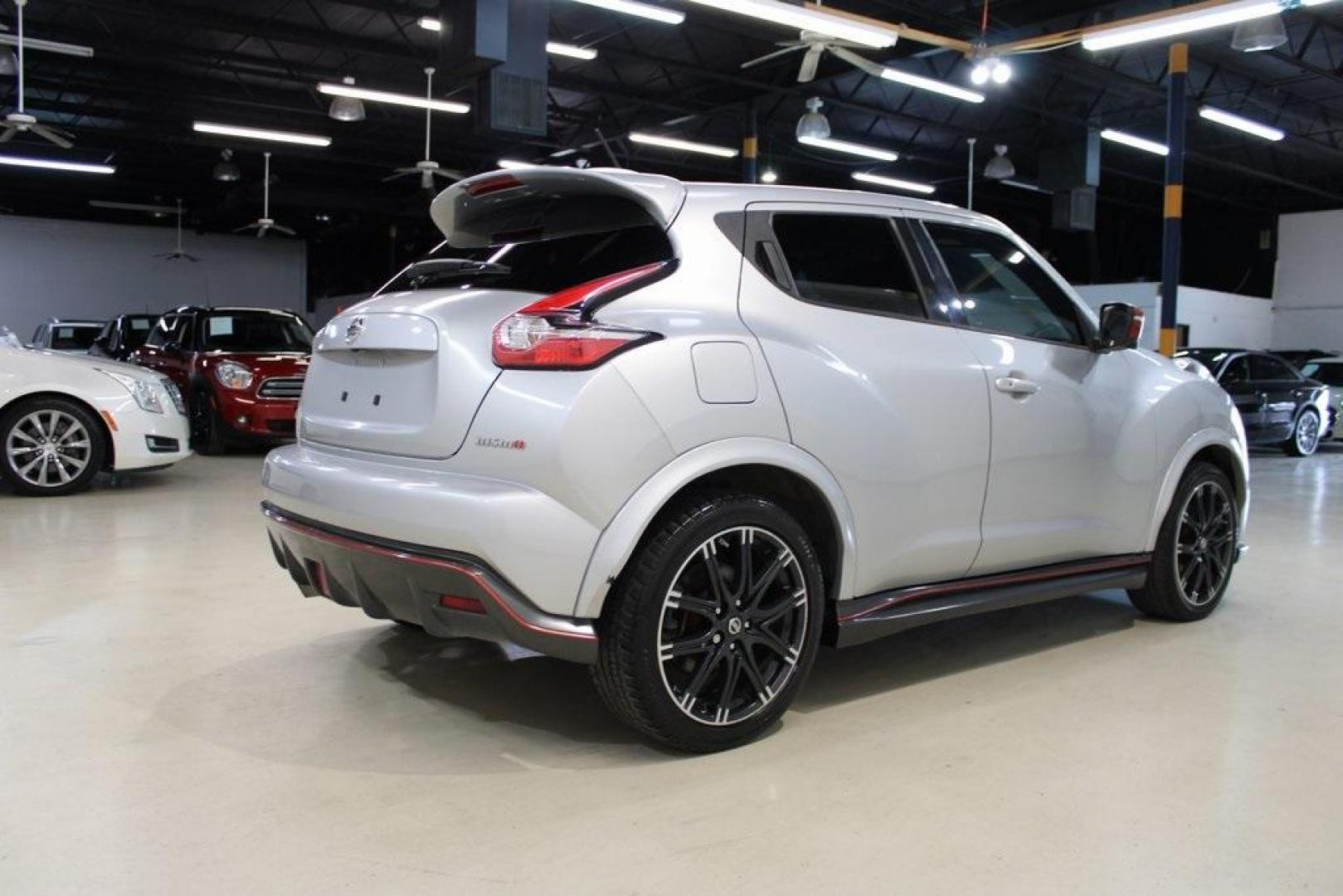 2015 Brilliant Silver /Nismo Nissan Juke NISMO (JN8AF5MVXFT) with an 1.6L I4 DOHC 16V engine, CVT transmission, located at 15300 Midway Rd., Addison, TX, 75001, (972) 702-0011, 32.958321, -96.838074 - HOME OF THE NO HAGGLE PRICE - WHOLESALE PRICES TO THE PUBLIC!! Juke NISMO, 4D Sport Utility, 1.6L I4 DOHC 16V, CVT with Xtronic, AWD, Brilliant Silver, Nismo Artificial Leather.<br><br>Brilliant Silver 2015 Nissan Juke NISMO<br><br>Recent Arrival! 26/31 City/Highway MPG<br><br><br>At Midway Auto Gro - Photo#2