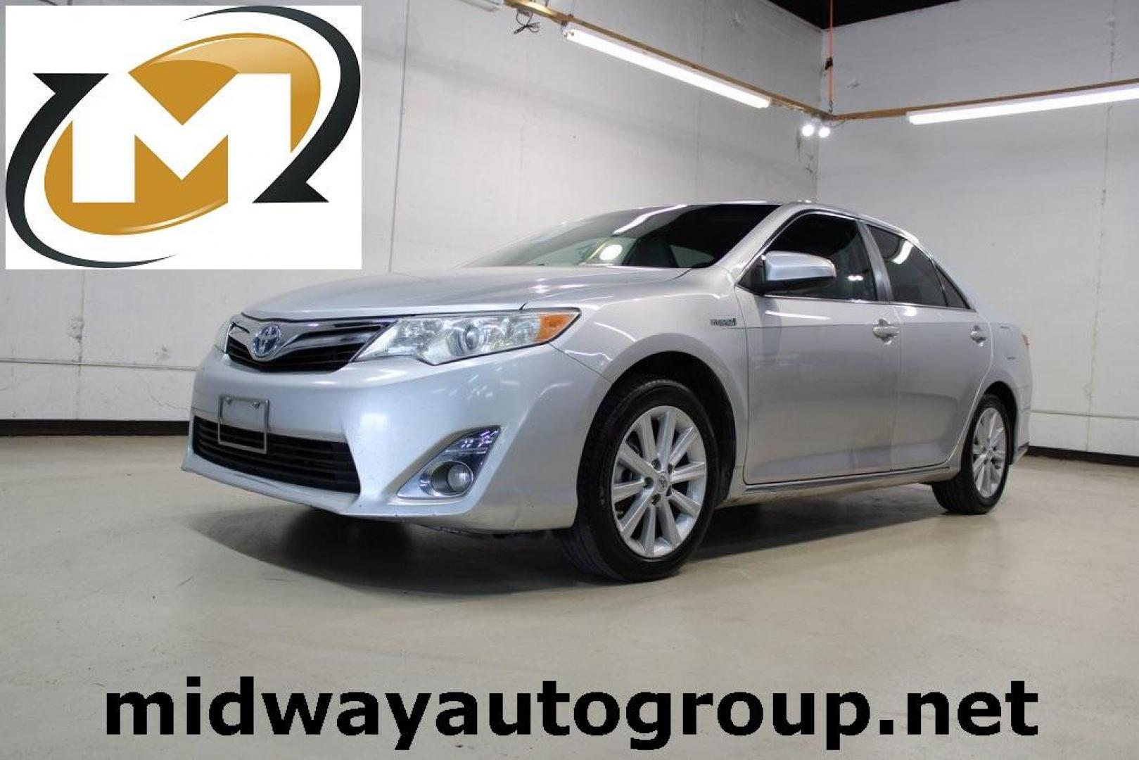 2012 Classic Silver Metallic /Ivory Toyota Camry Hybrid XLE (4T1BD1FK6CU) with an 2.5L I4 Hybrid DOHC engine, CVT transmission, located at 15300 Midway Rd., Addison, TX, 75001, (972) 702-0011, 32.958321, -96.838074 - HOME OF THE NO HAGGLE PRICE - WHOLESALE PRICES TO THE PUBLIC!! Camry Hybrid XLE, 4D Sedan, 2.5L I4 Hybrid DOHC, eCVT, FWD, Silver, Cloth.<br><br>Silver 2012 Toyota Camry Hybrid XLE<br><br>Recent Arrival! 40/38 City/Highway MPG<br><br>Awards:<br> * 2012 KBB.com Best Resale Value Awards<br><br>At Mid - Photo#0