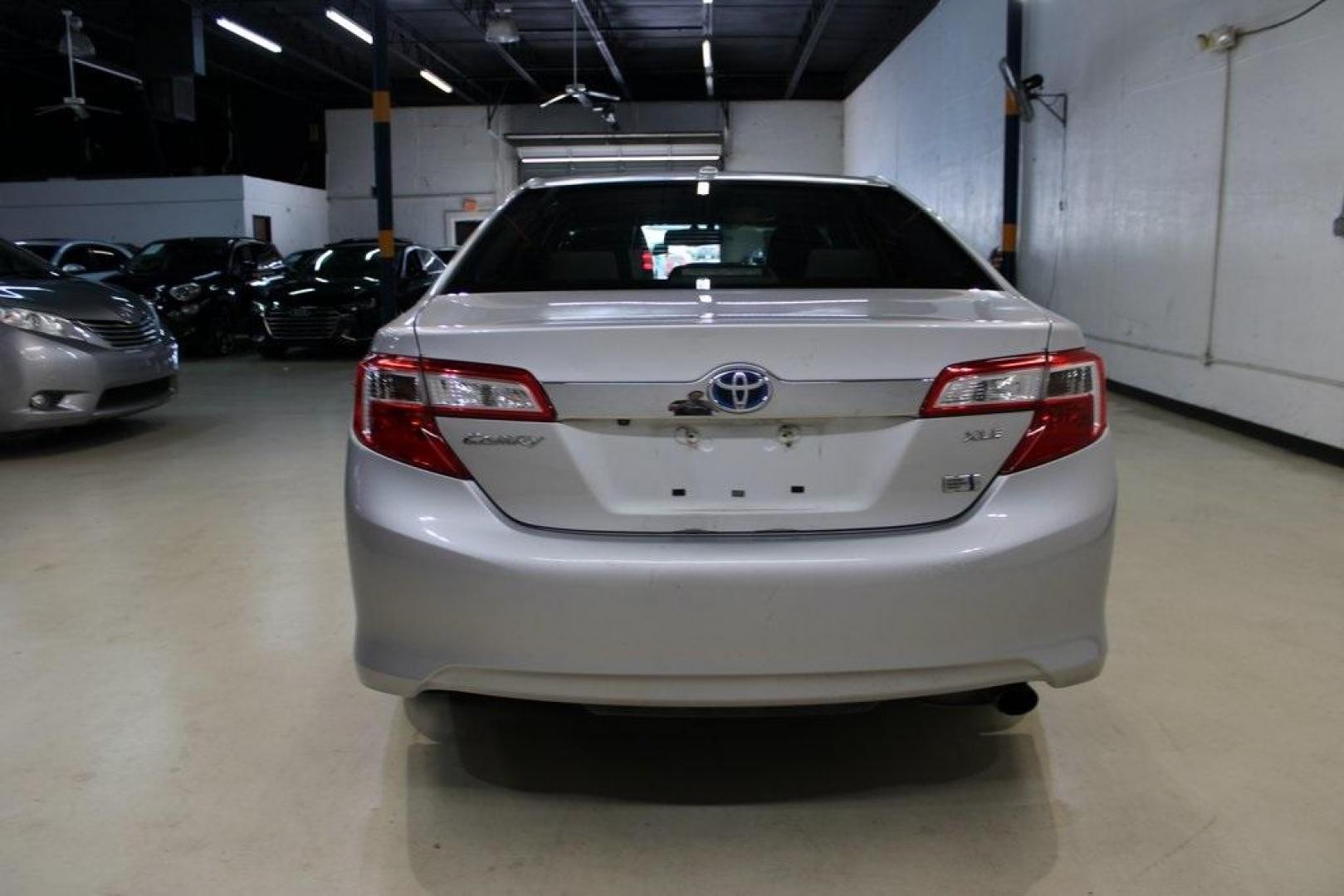 2012 Classic Silver Metallic /Ivory Toyota Camry Hybrid XLE (4T1BD1FK6CU) with an 2.5L I4 Hybrid DOHC engine, CVT transmission, located at 15300 Midway Rd., Addison, TX, 75001, (972) 702-0011, 32.958321, -96.838074 - HOME OF THE NO HAGGLE PRICE - WHOLESALE PRICES TO THE PUBLIC!! Camry Hybrid XLE, 4D Sedan, 2.5L I4 Hybrid DOHC, eCVT, FWD, Silver, Cloth.<br><br>Silver 2012 Toyota Camry Hybrid XLE<br><br>Recent Arrival! 40/38 City/Highway MPG<br><br>Awards:<br> * 2012 KBB.com Best Resale Value Awards<br><br>At Mid - Photo#7