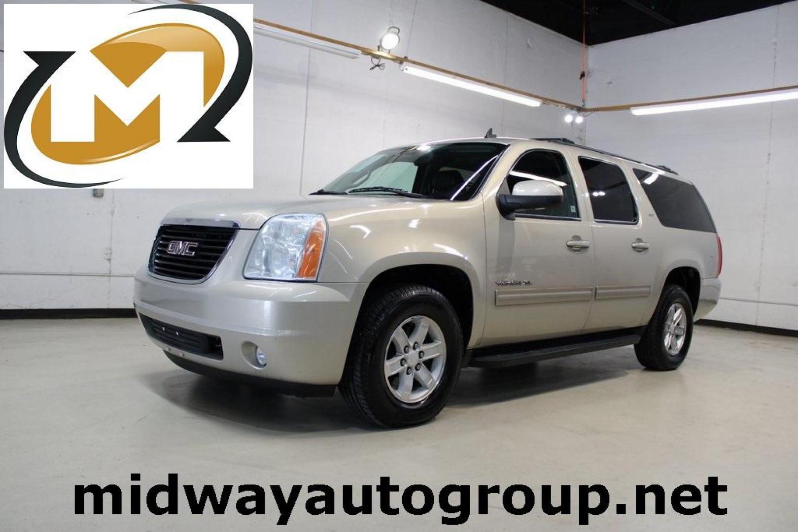 2011 Gold Mist Metallic /Ebony GMC Yukon XL SLT 1500 (1GKS1KE04BR) with an Vortec 5.3L V8 SFI Flex Fuel engine, Automatic transmission, located at 15300 Midway Rd., Addison, TX, 75001, (972) 702-0011, 32.958321, -96.838074 - HOME OF THE NO HAGGLE PRICE - WHOLESALE PRICES TO THE PUBLIC!! Yukon XL SLT 1500, 4D Sport Utility, Vortec 5.3L V8 SFI Flex Fuel, 6-Speed Automatic HD Electronic with Overdrive, RWD, Gold Mist Metallic, Ebony Leather.<br><br>Gold Mist Metallic 2011 GMC Yukon XL SLT 1500<br><br>Recent Arrival!<br><br - Photo#0