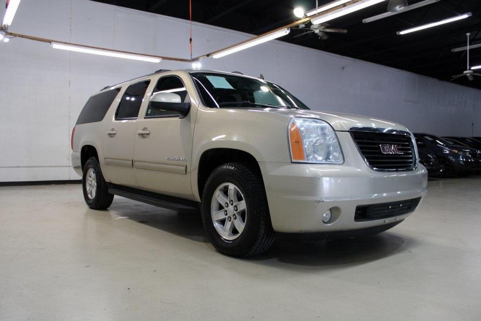 2011 Gold Mist Metallic /Ebony GMC Yukon XL SLT 1500 (1GKS1KE04BR) with an Vortec 5.3L V8 SFI Flex Fuel engine, Automatic transmission, located at 15300 Midway Rd., Addison, TX, 75001, (972) 702-0011, 32.958321, -96.838074 - HOME OF THE NO HAGGLE PRICE - WHOLESALE PRICES TO THE PUBLIC!! Yukon XL SLT 1500, 4D Sport Utility, Vortec 5.3L V8 SFI Flex Fuel, 6-Speed Automatic HD Electronic with Overdrive, RWD, Gold Mist Metallic, Ebony Leather.<br><br>Gold Mist Metallic 2011 GMC Yukon XL SLT 1500<br><br>Recent Arrival!<br><br - Photo#1